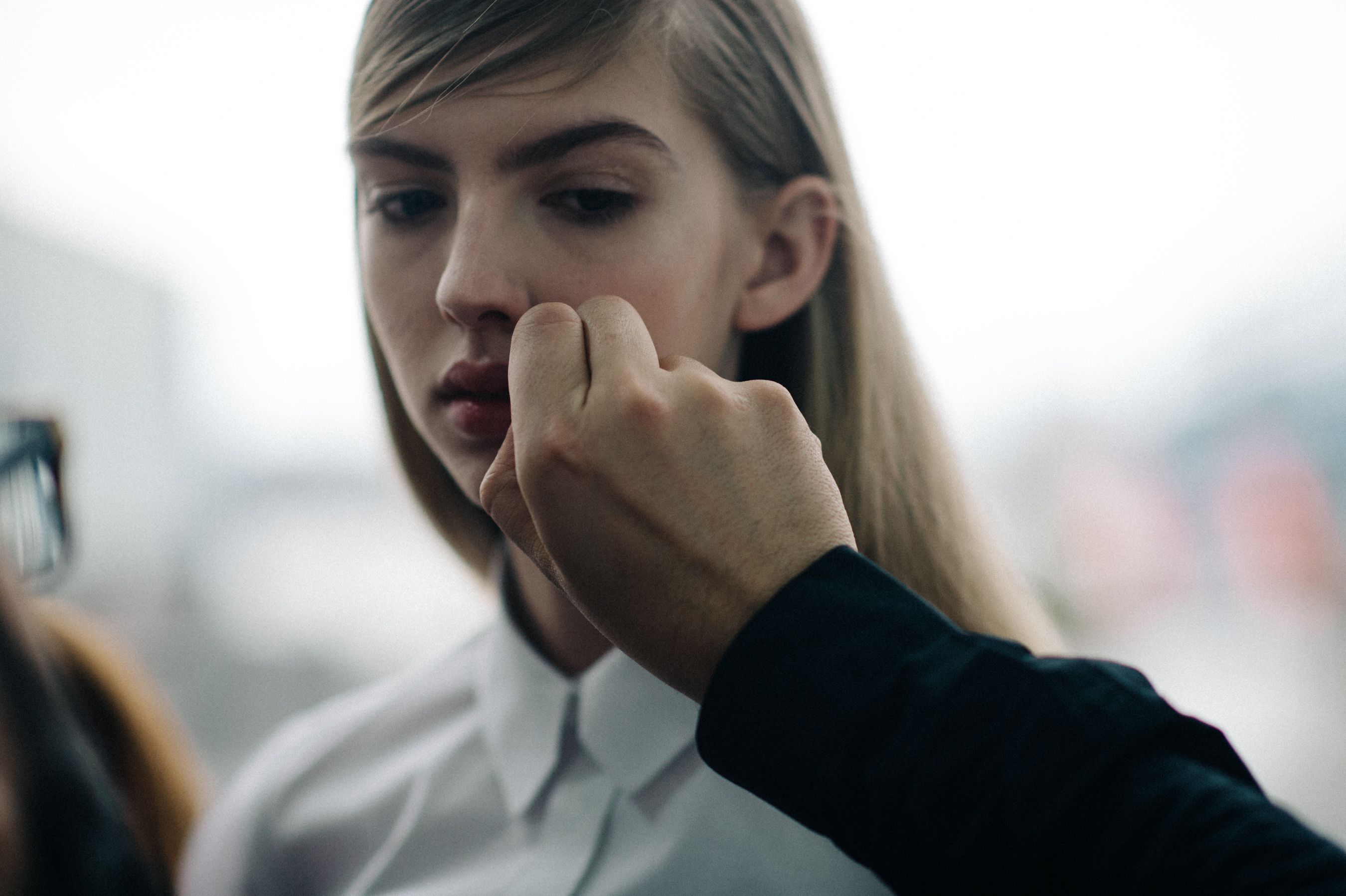 Model getting face touched up