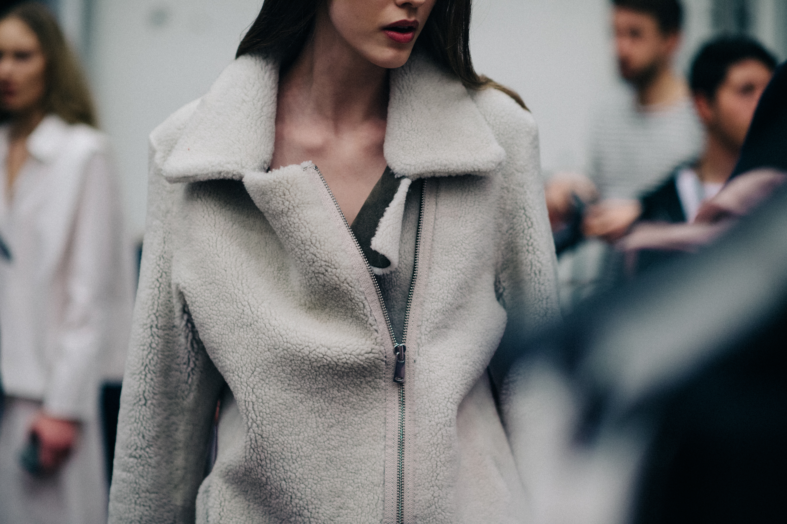 Model wearing gray shearling