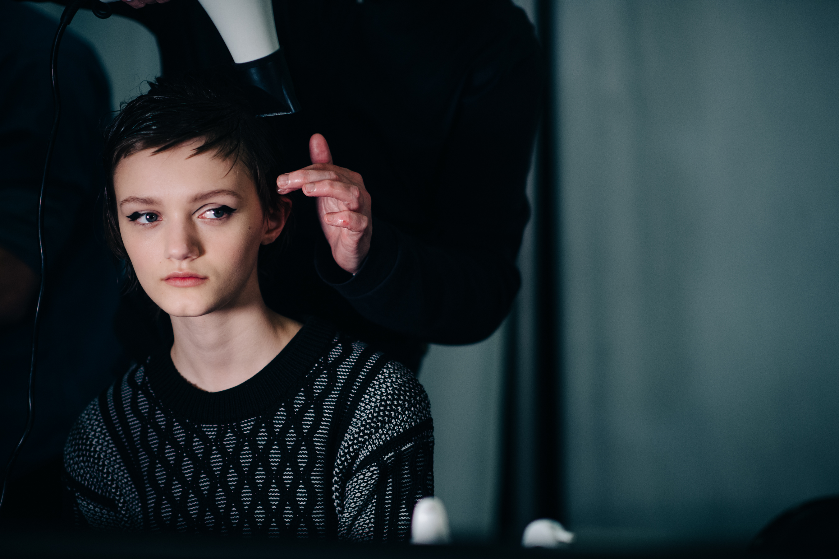 Model getting hair done