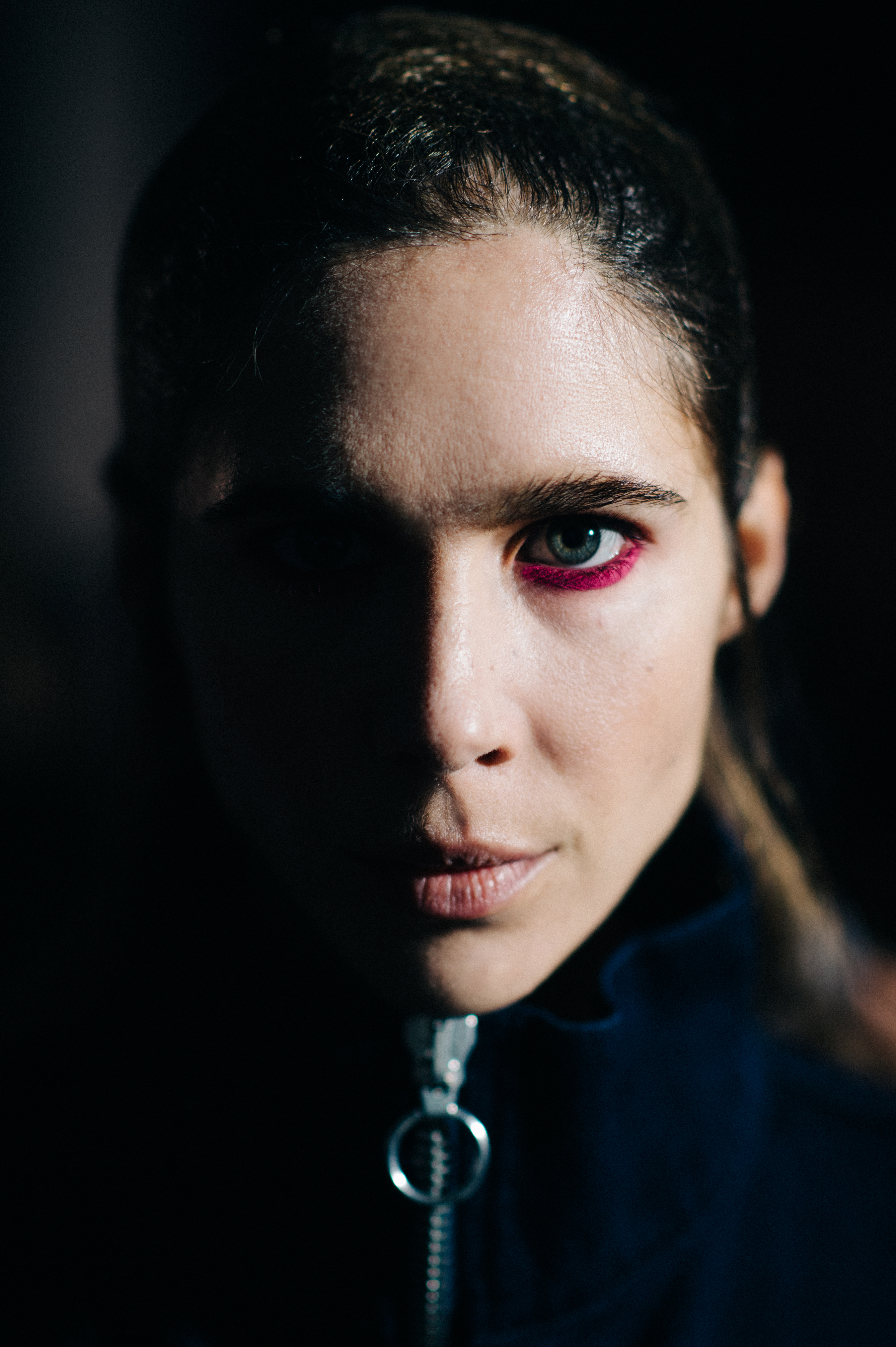 Portrait of a model wearing pink make up
