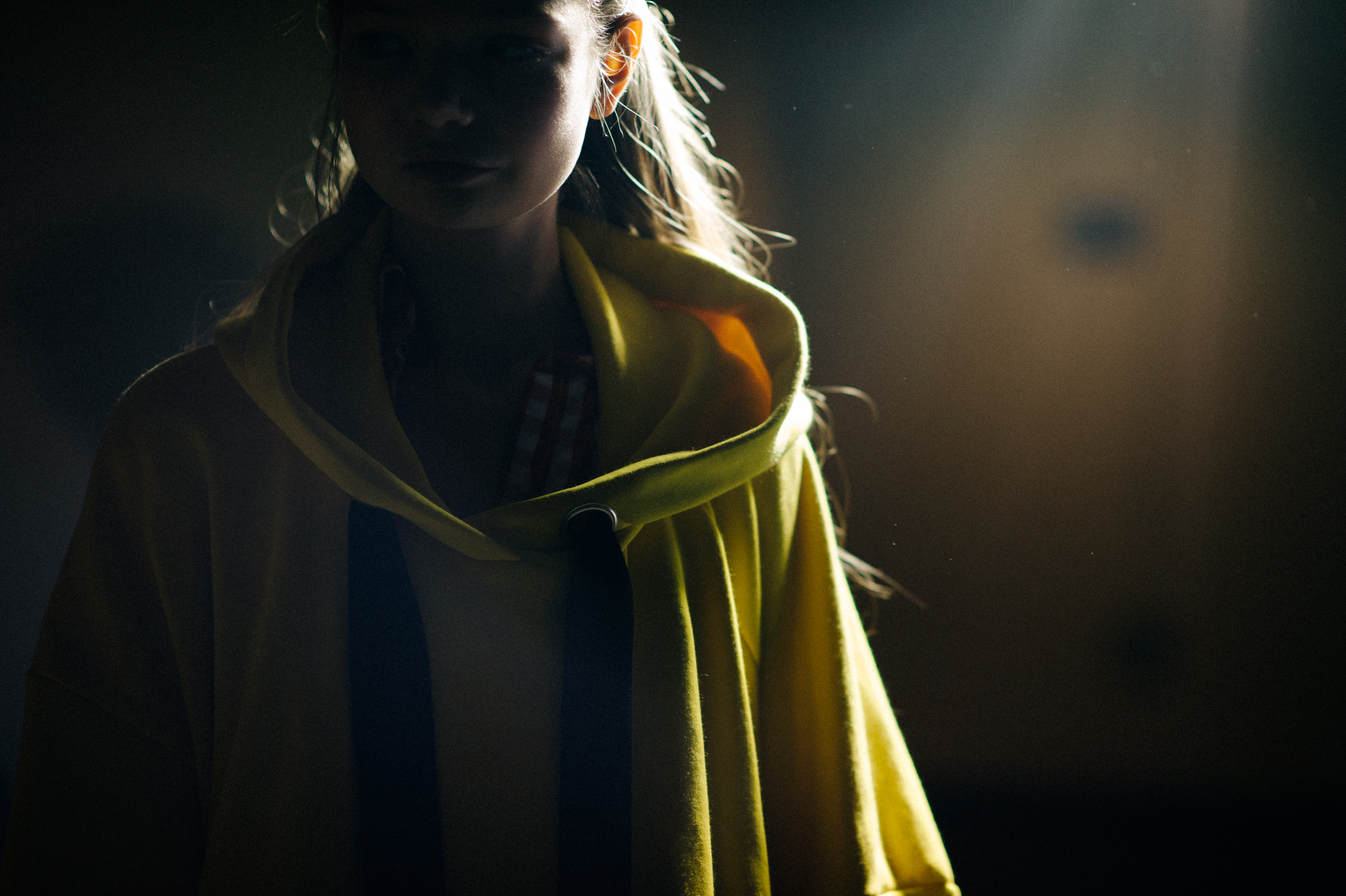 Model wearing yellow oversized hoodie