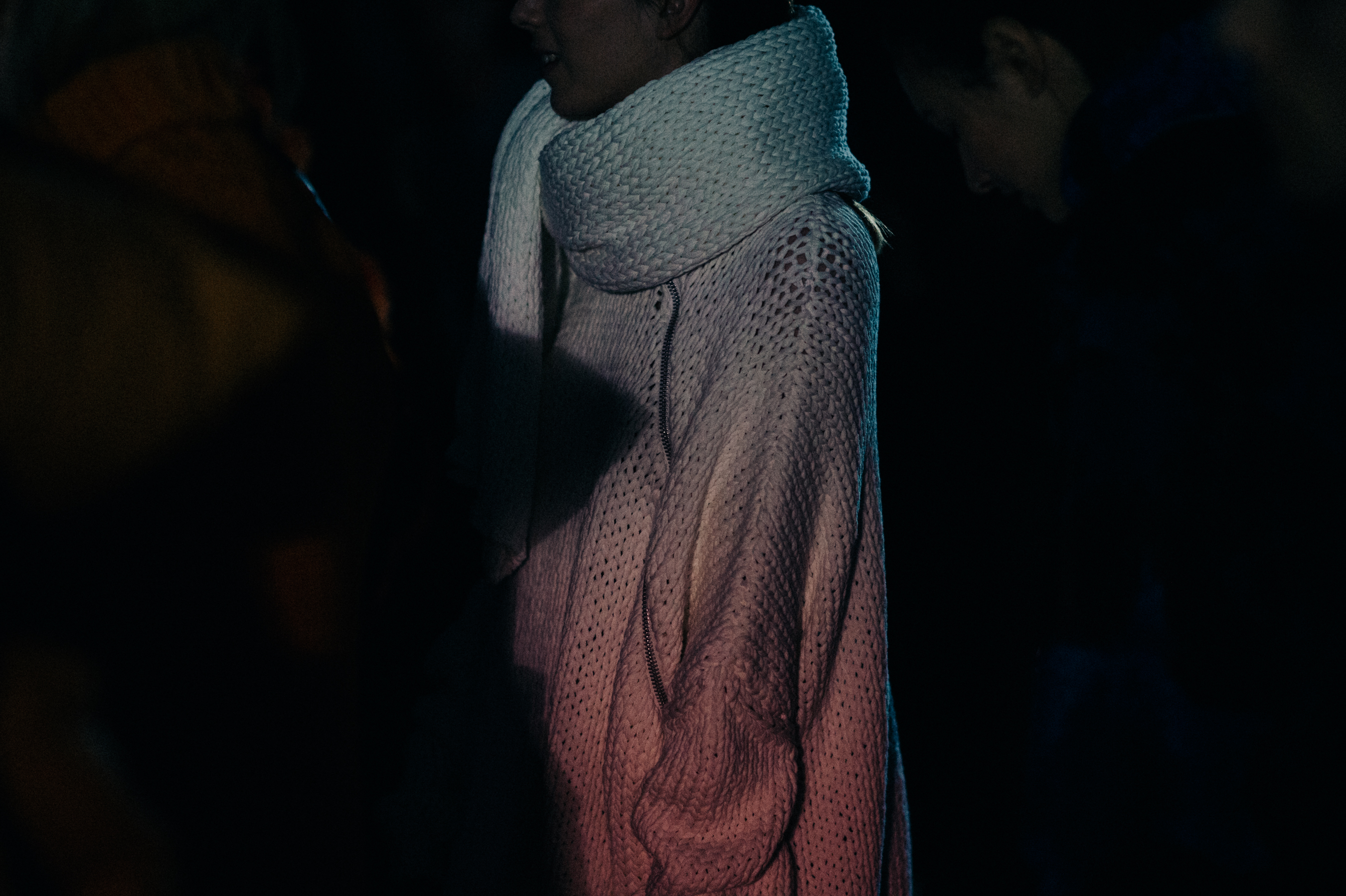 Model before the show in knitwear