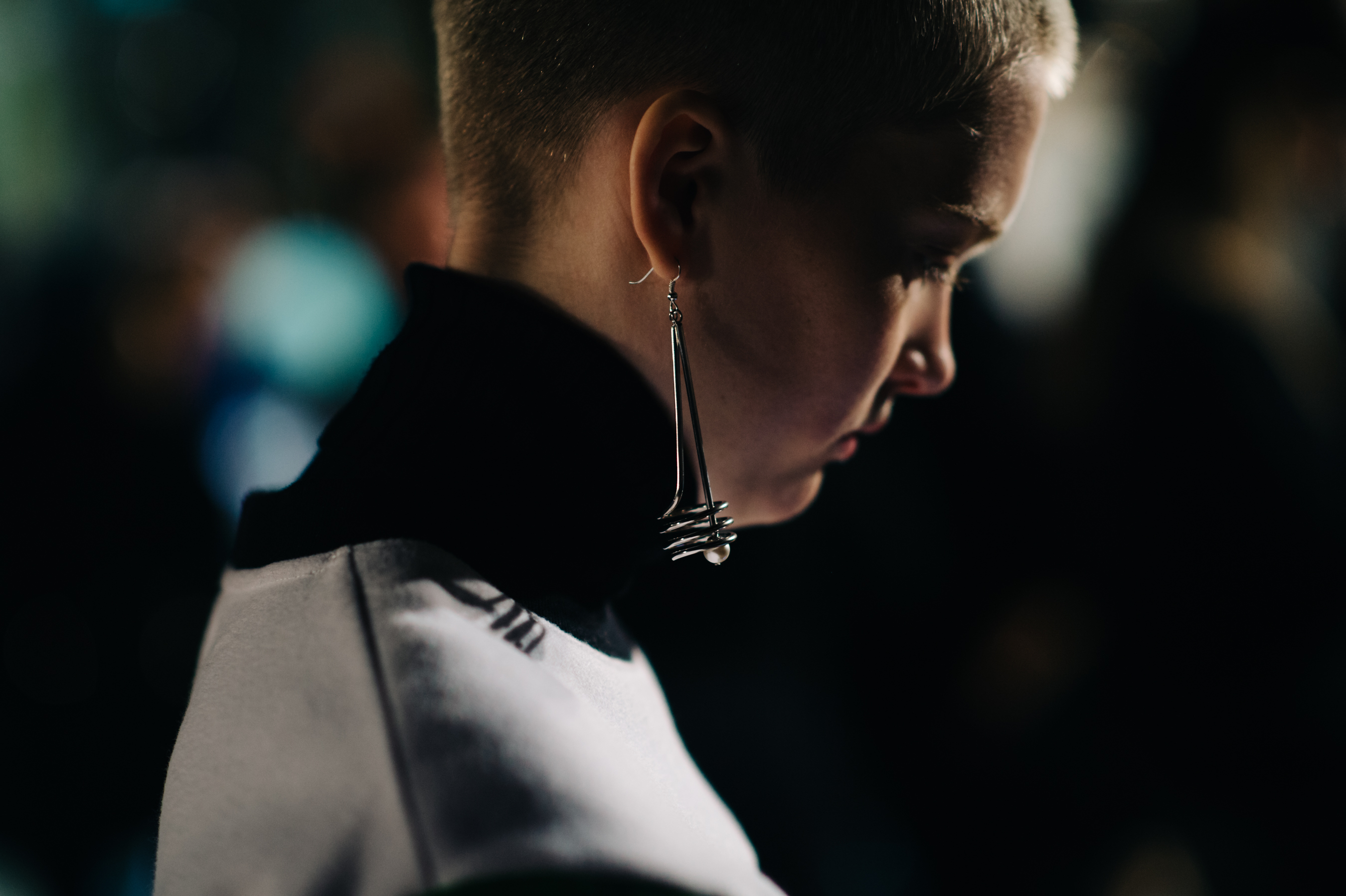 Model with the earring in the ear