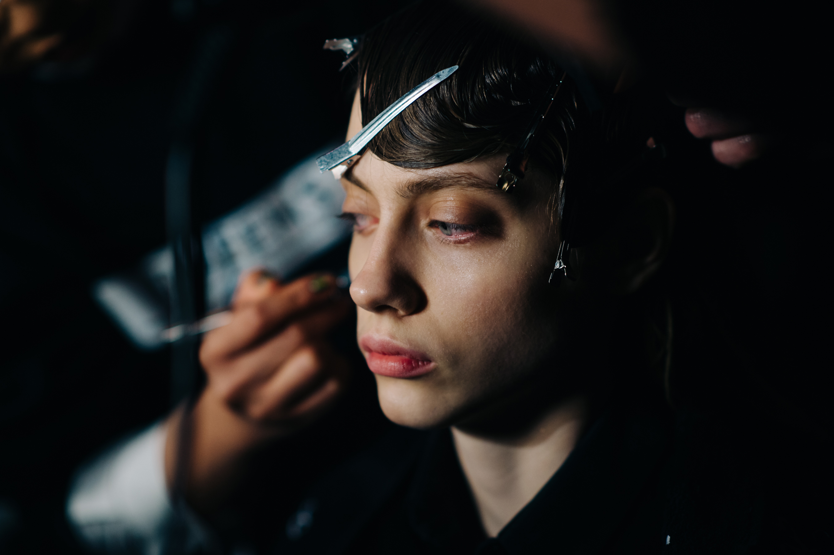 Model getting hair done
