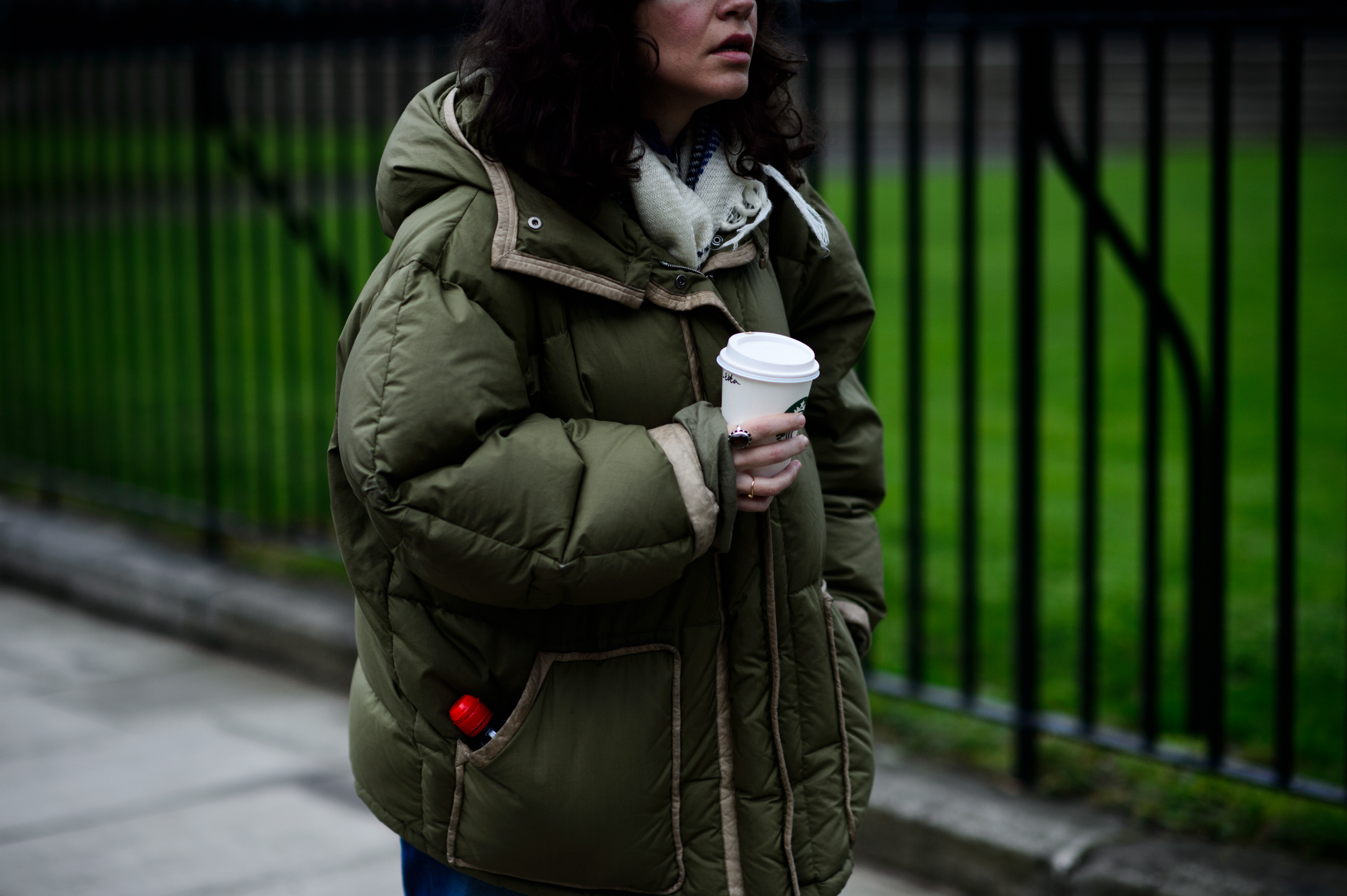 Woman wearing khaki jacket