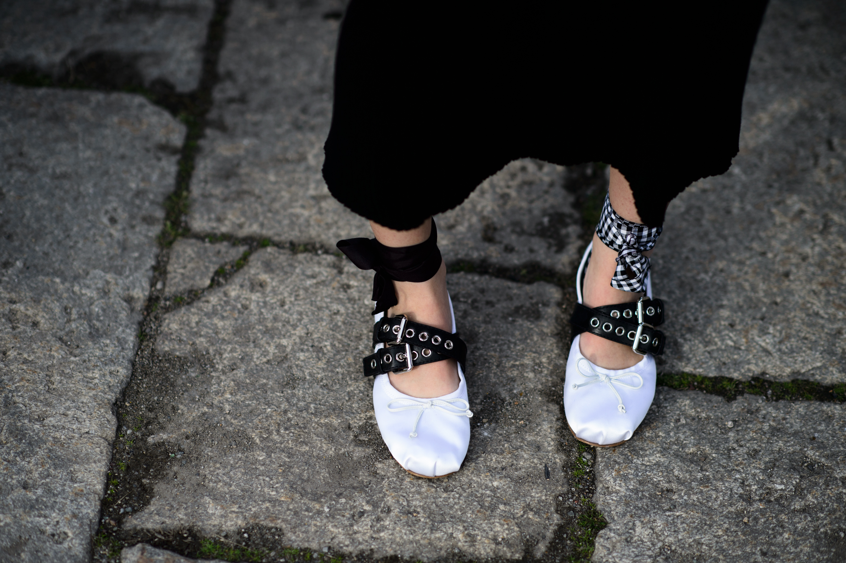 Close up of the white shoes
