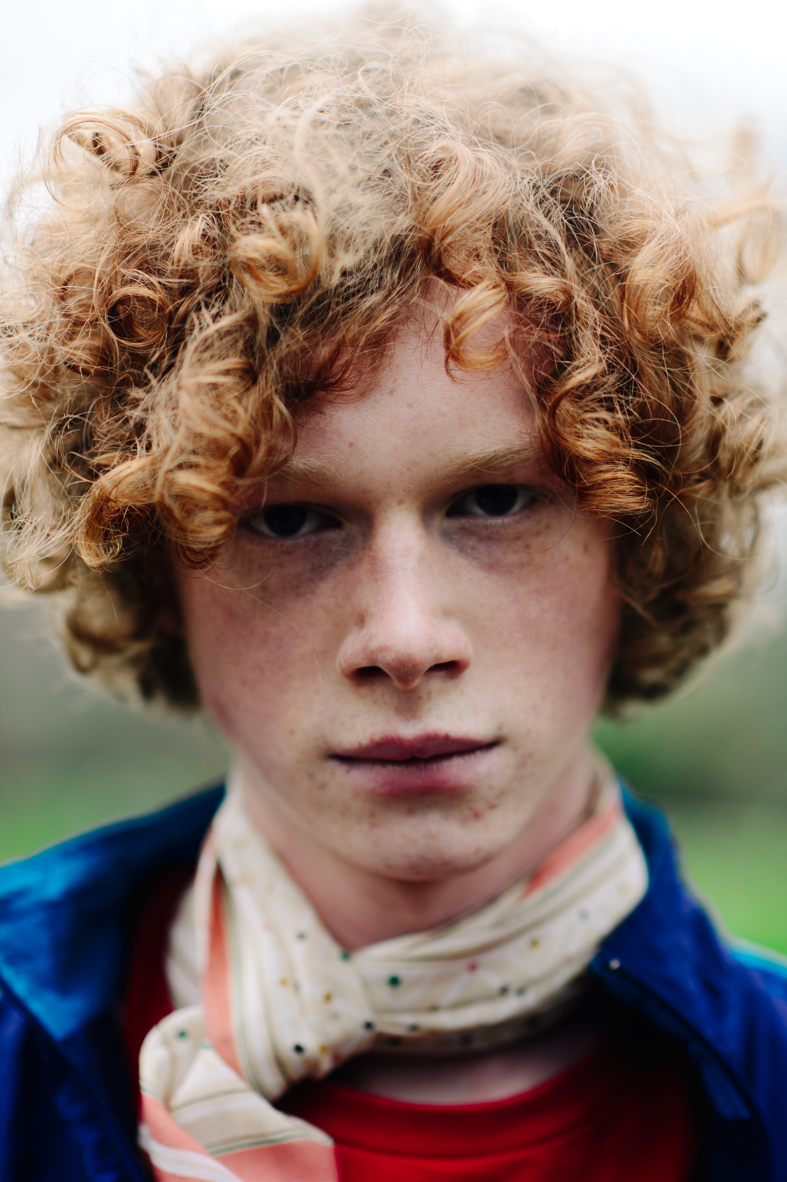 Portrait of a male model red curls