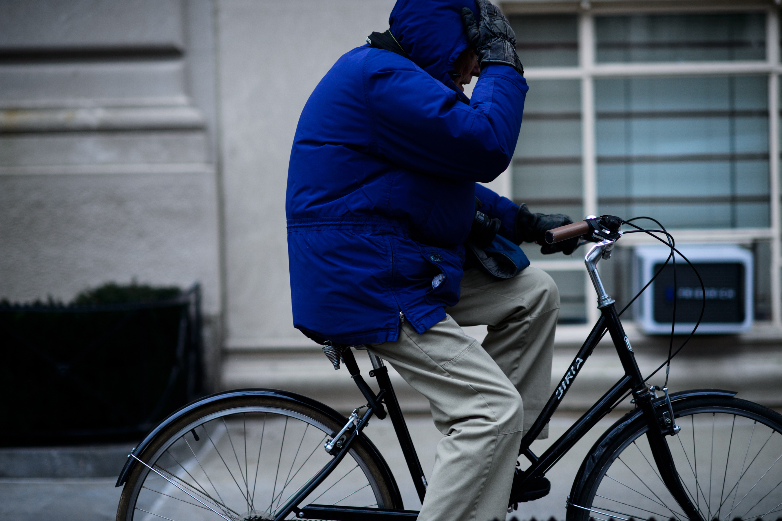 Photographer riding a bike