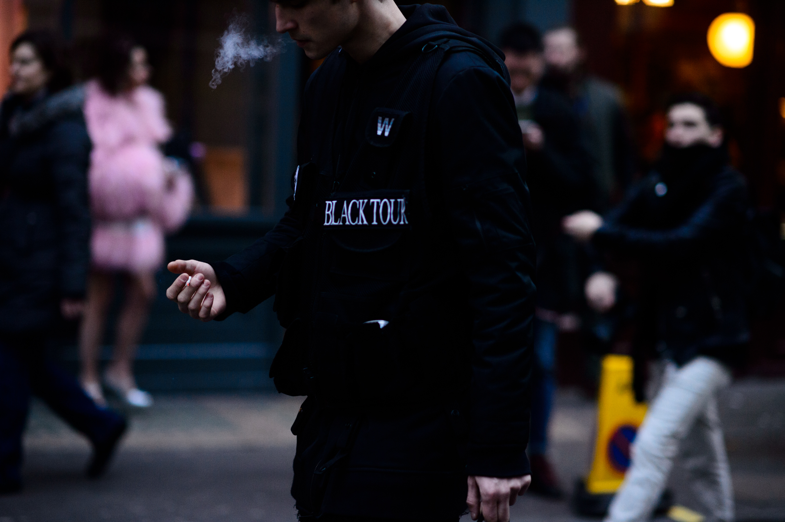 Man wearing black tour jacket