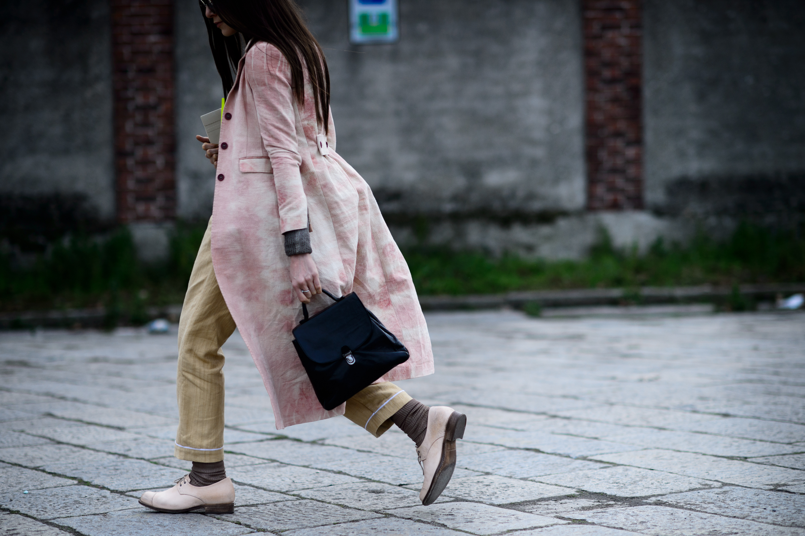 Woman wearing pink coat