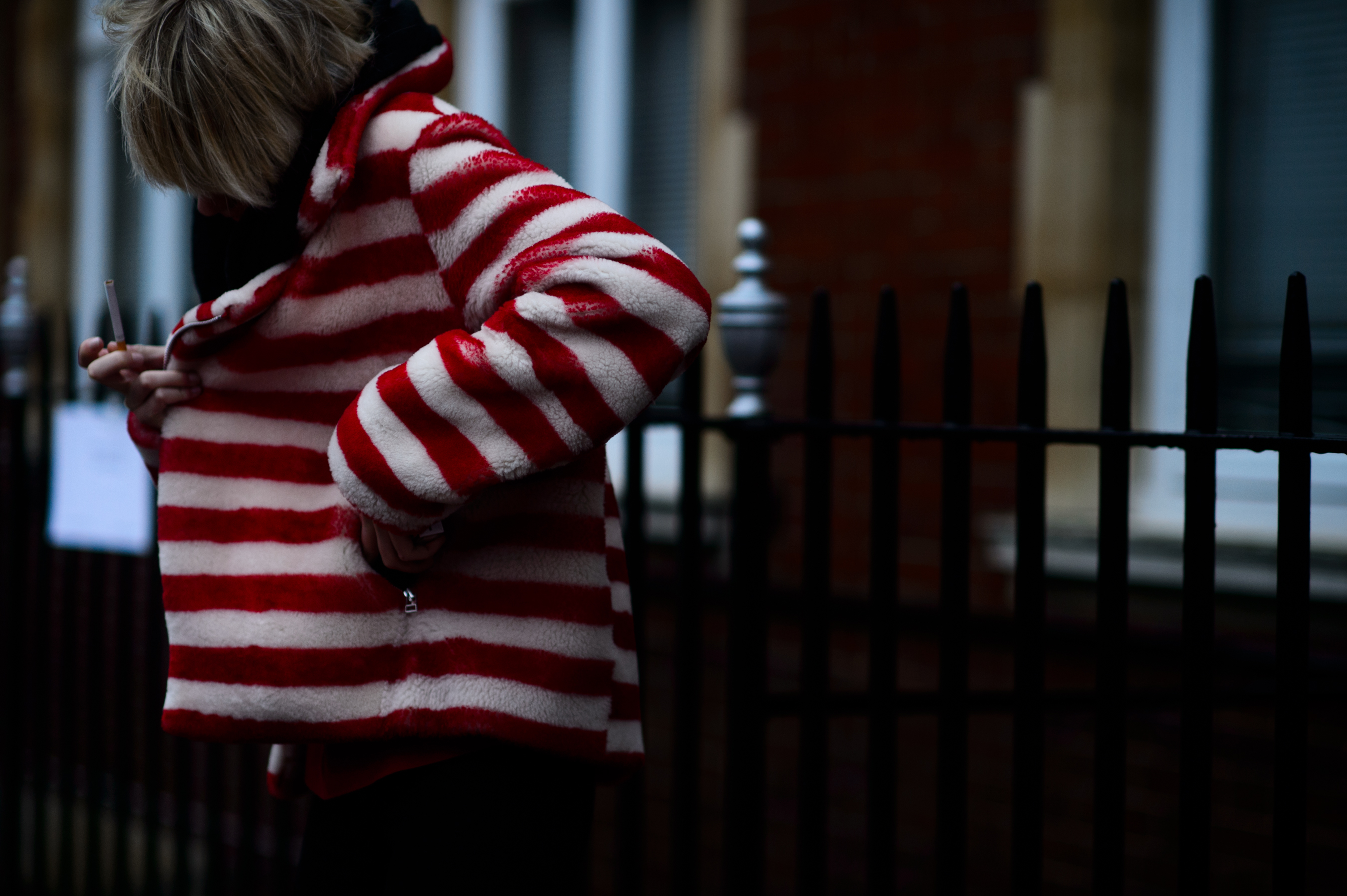 Model wearing striped plush coat