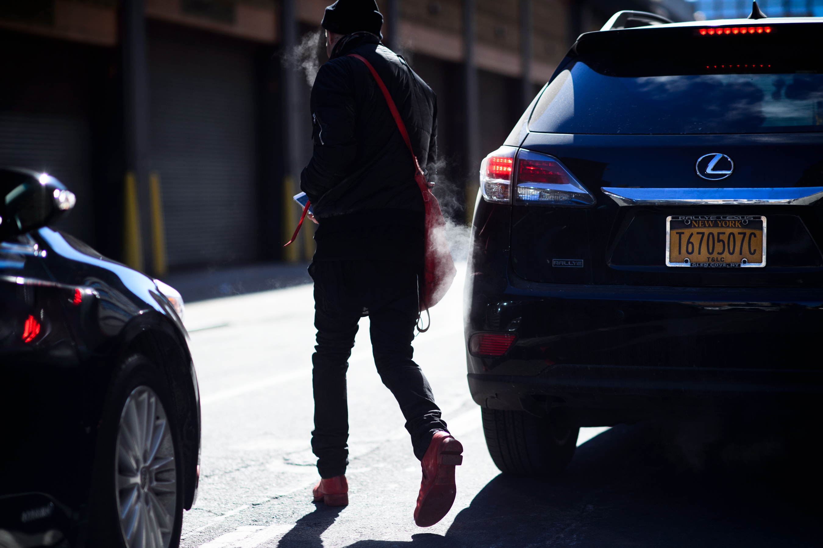Man wearing red shoes