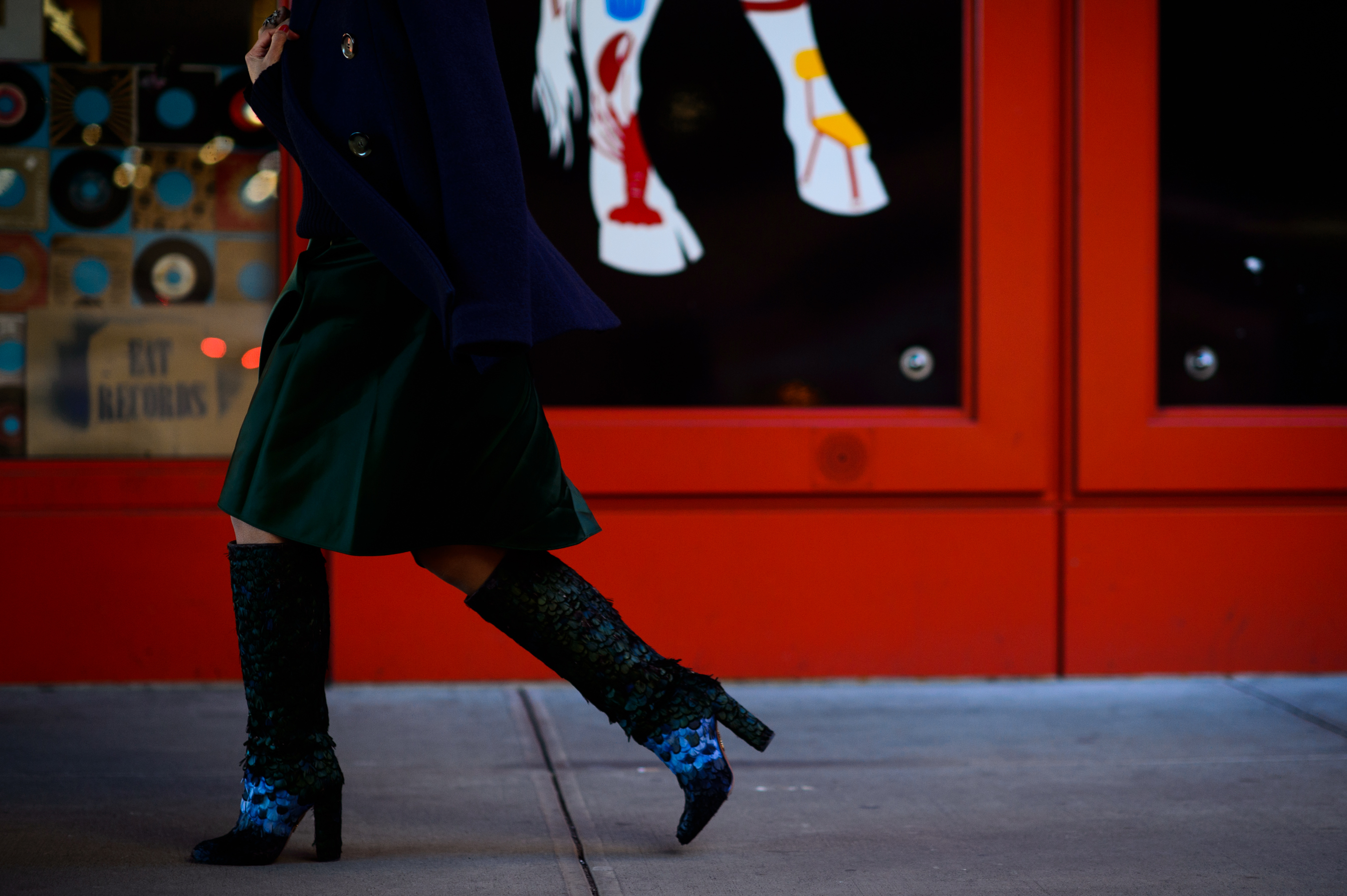 Arabic woman wearing feather boots