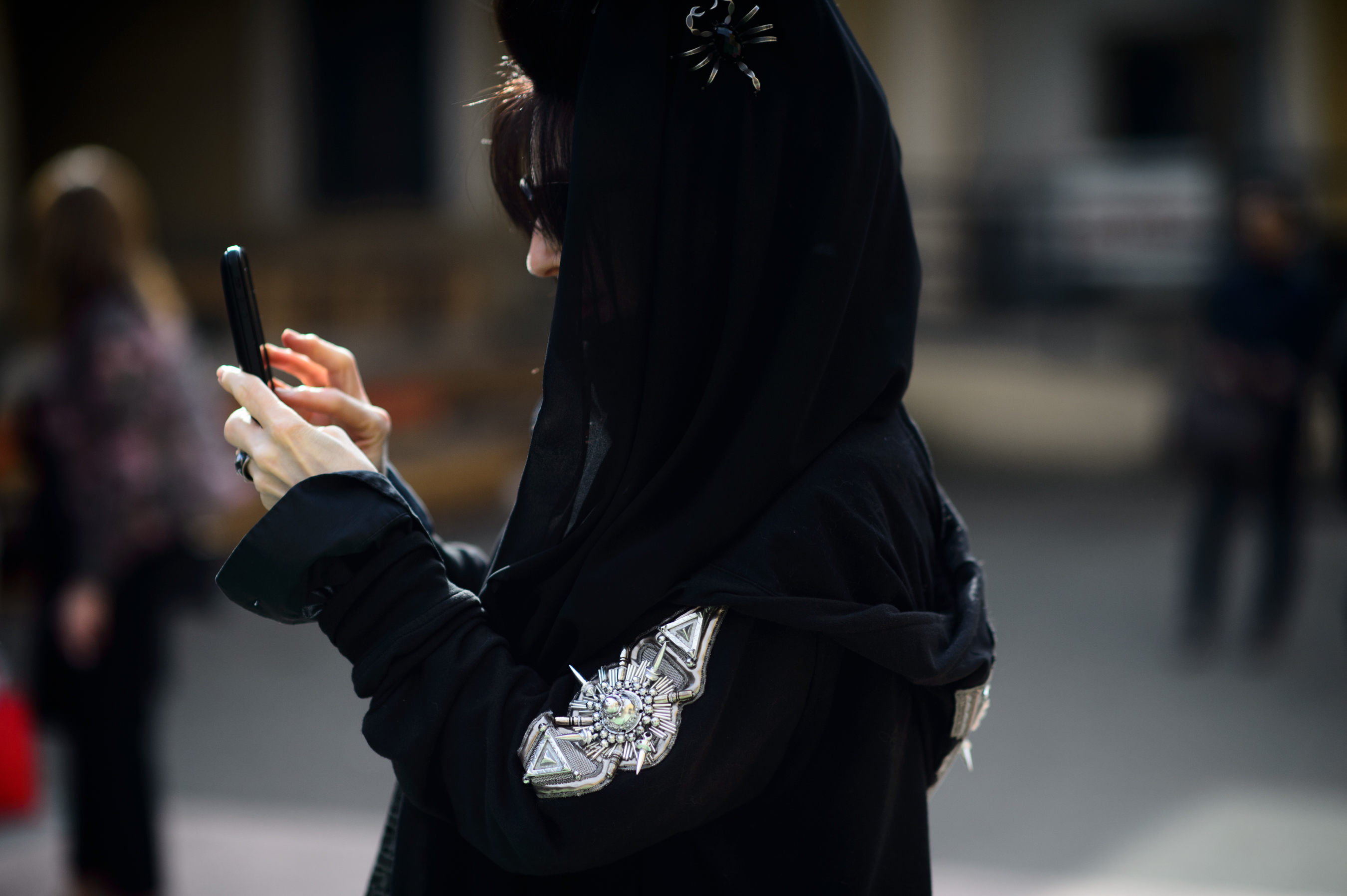 Woman wearing spiders