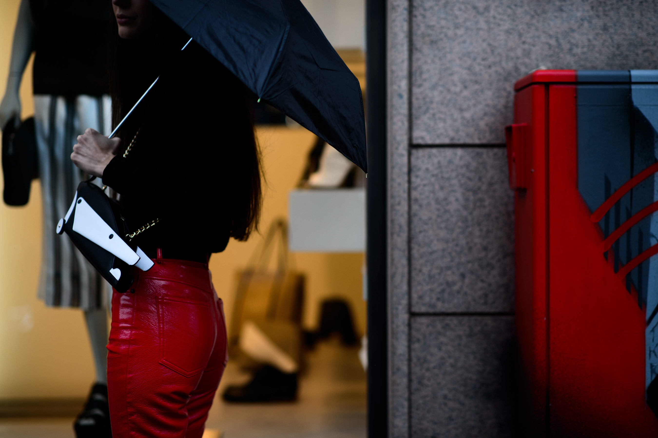 Italian girl wearing red leather pants