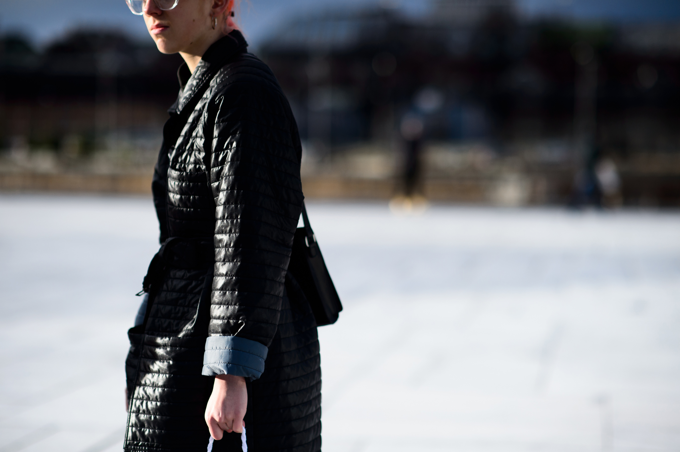 Editor in black coat