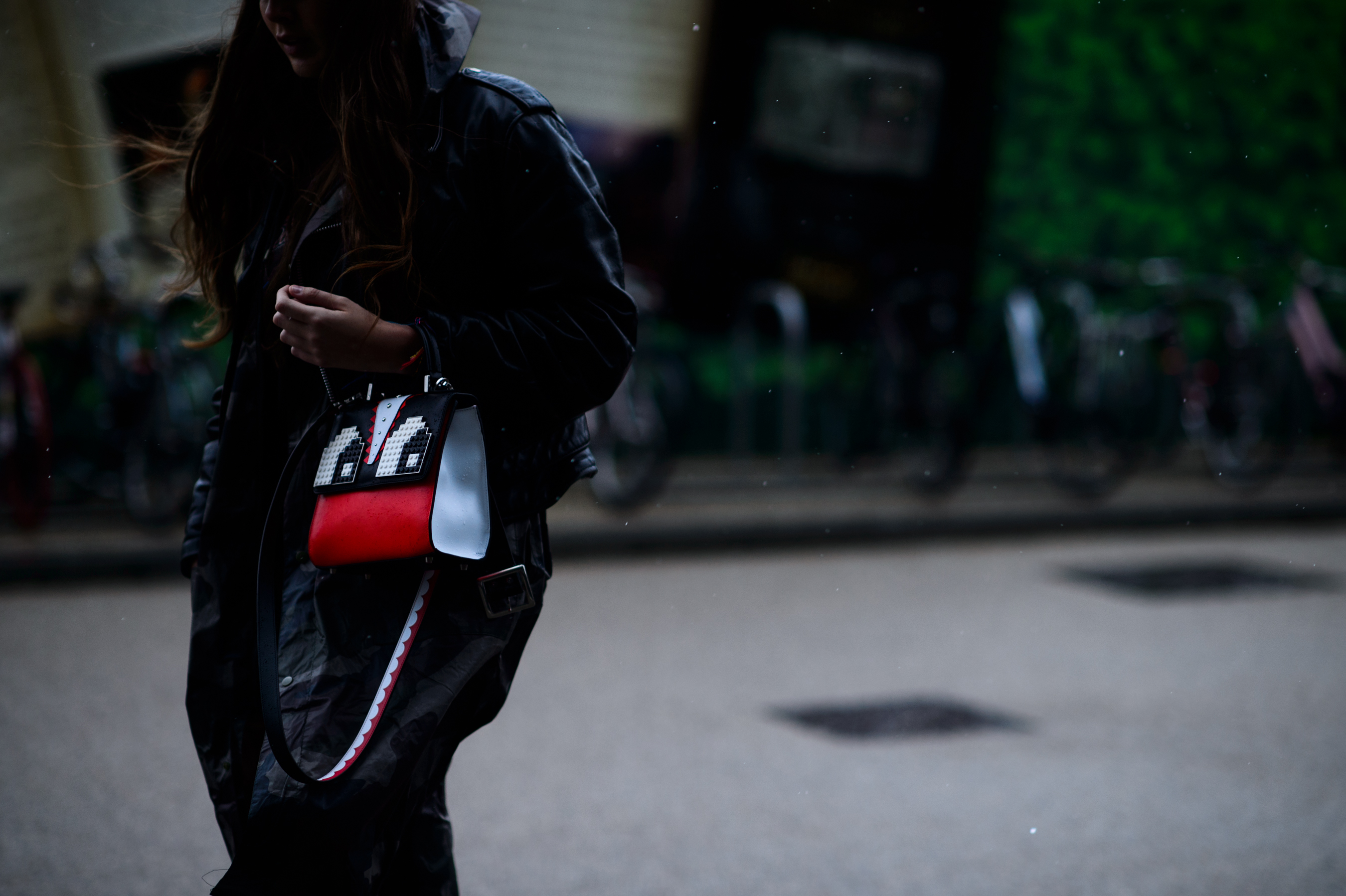Woman with bag with eyes