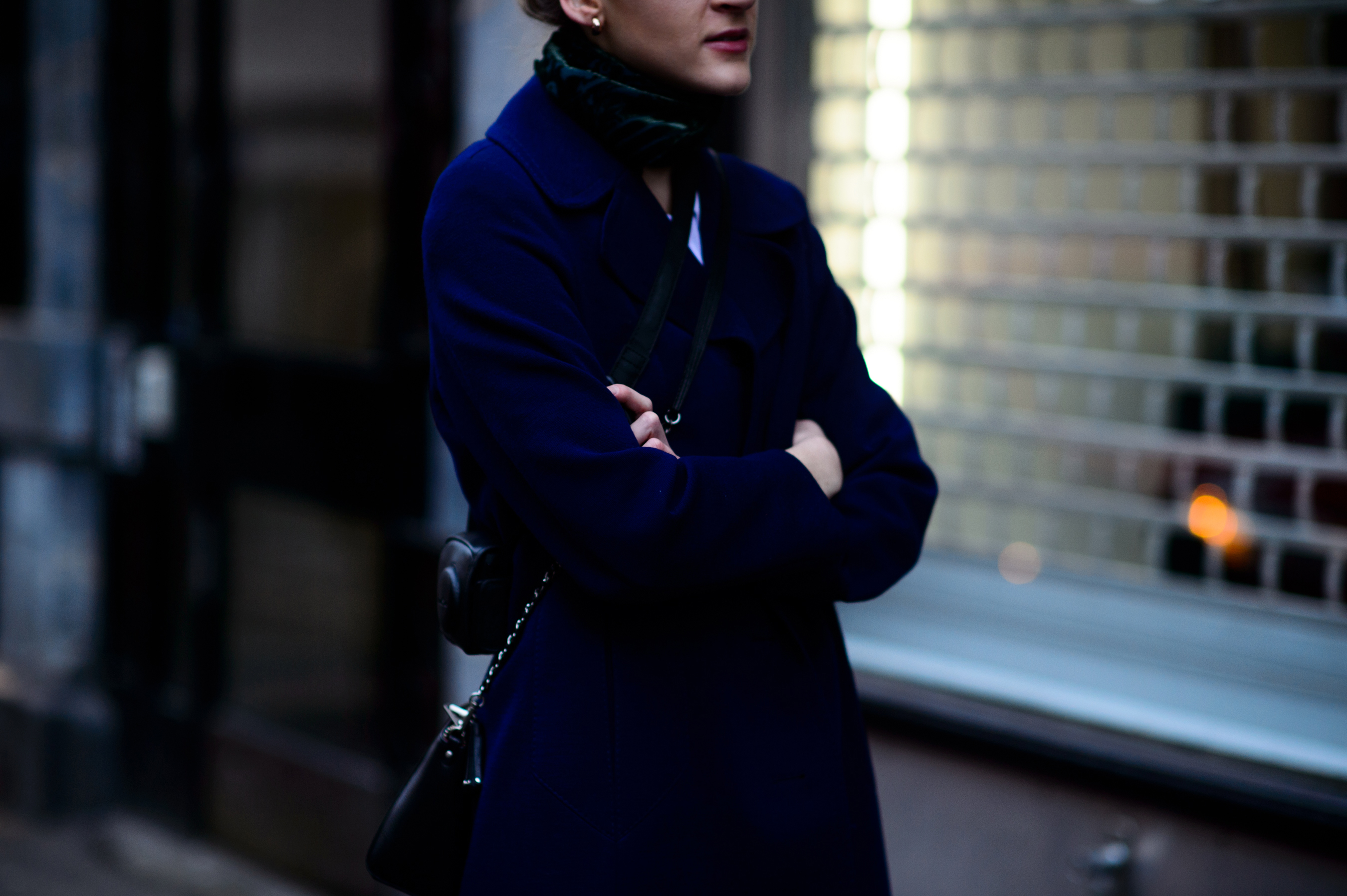 Woman in dark navy jacket