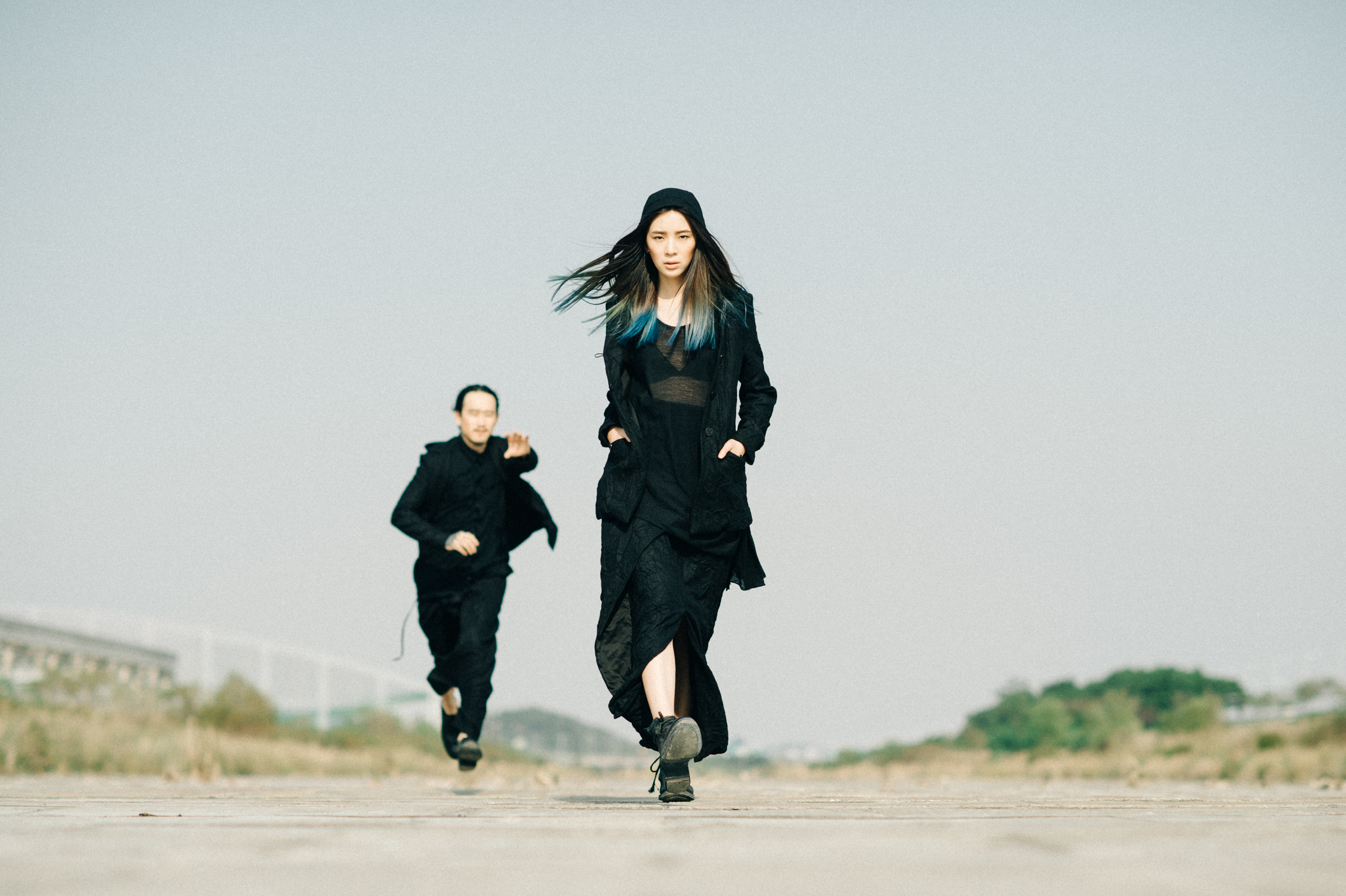 Two Korean models wearing black
