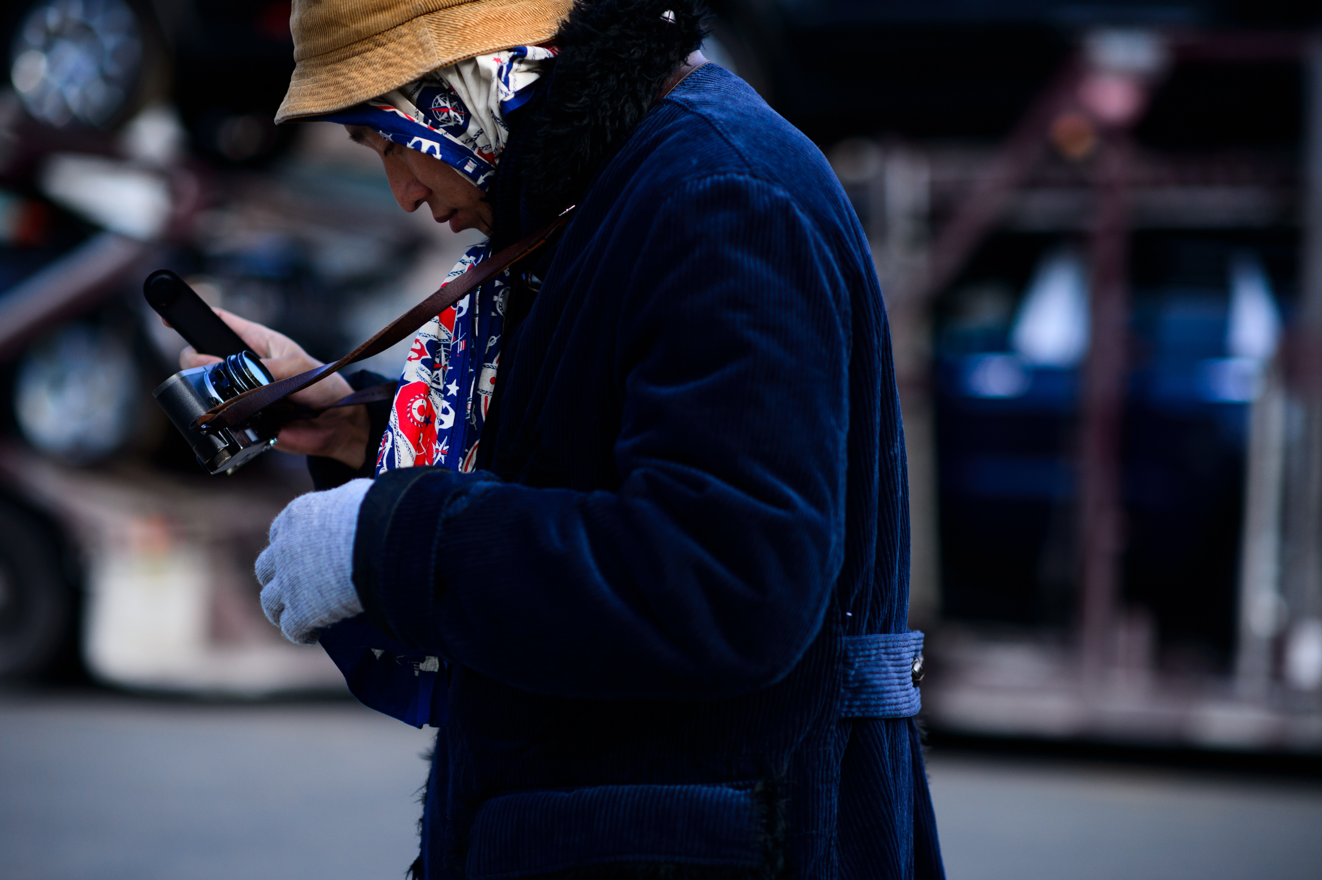 Photographer wearing blue coat