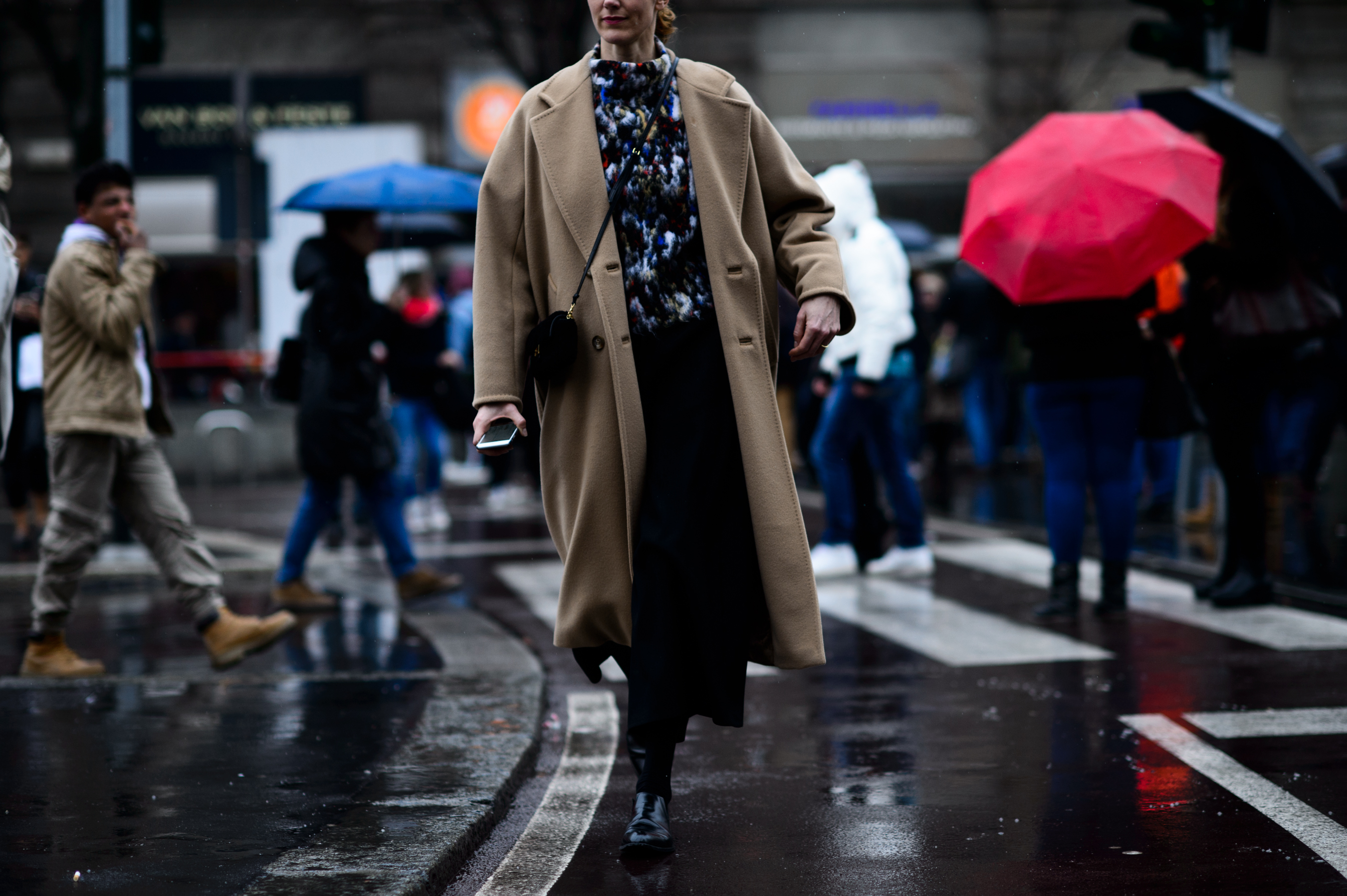 Fashion writer wearing long beige coat