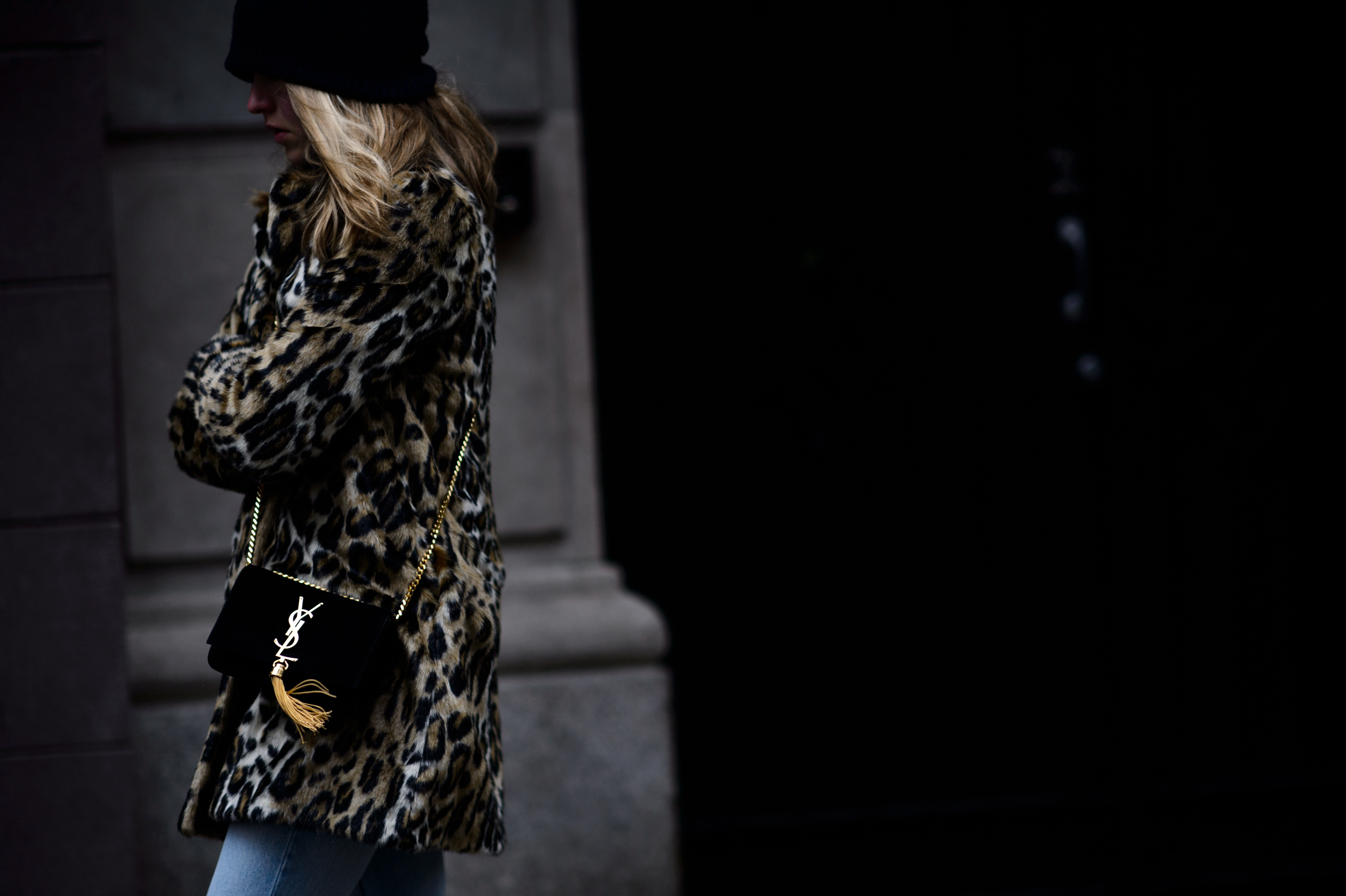 Woman wearing leopard coat