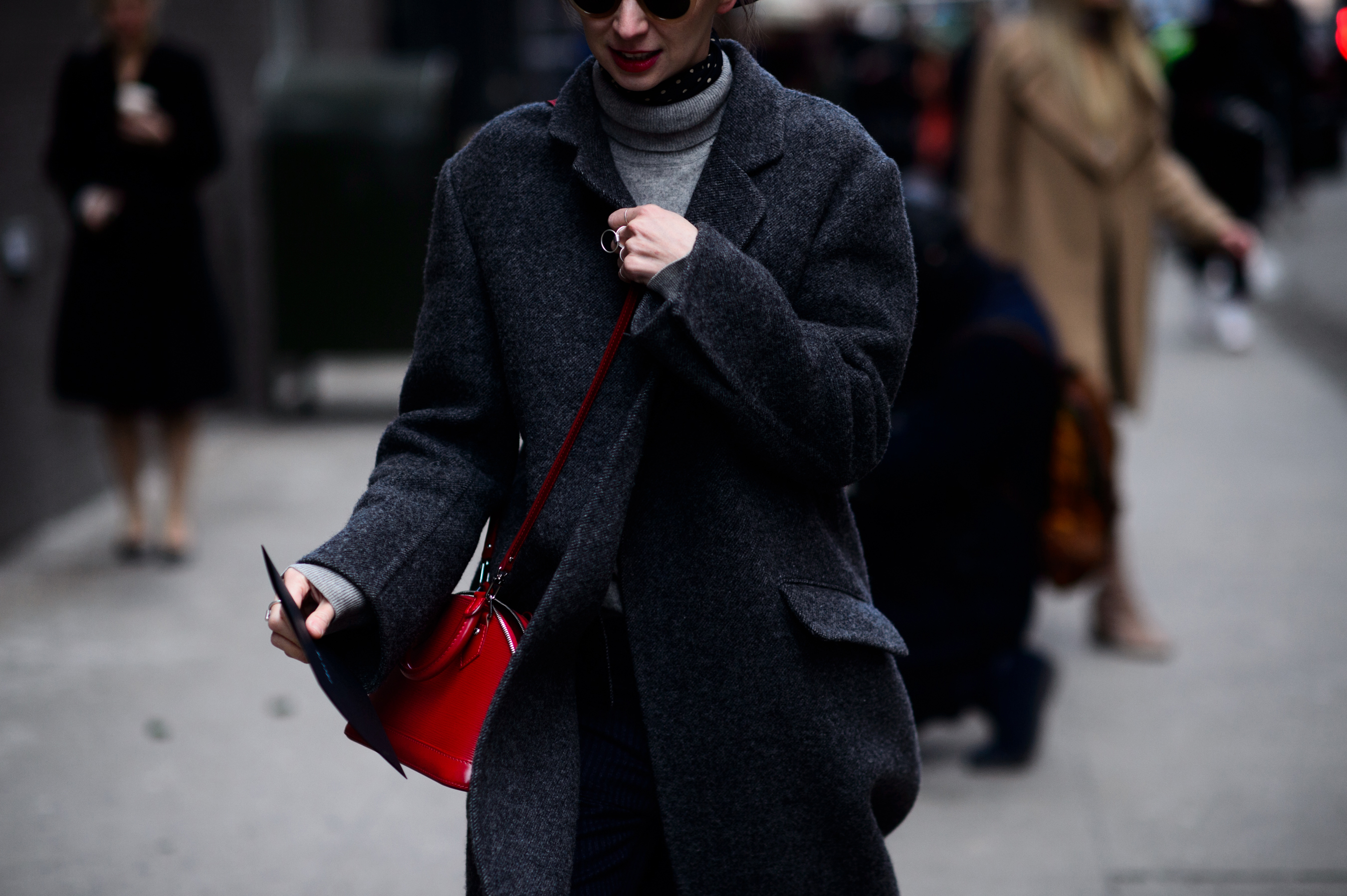 Woman wearing gray coat