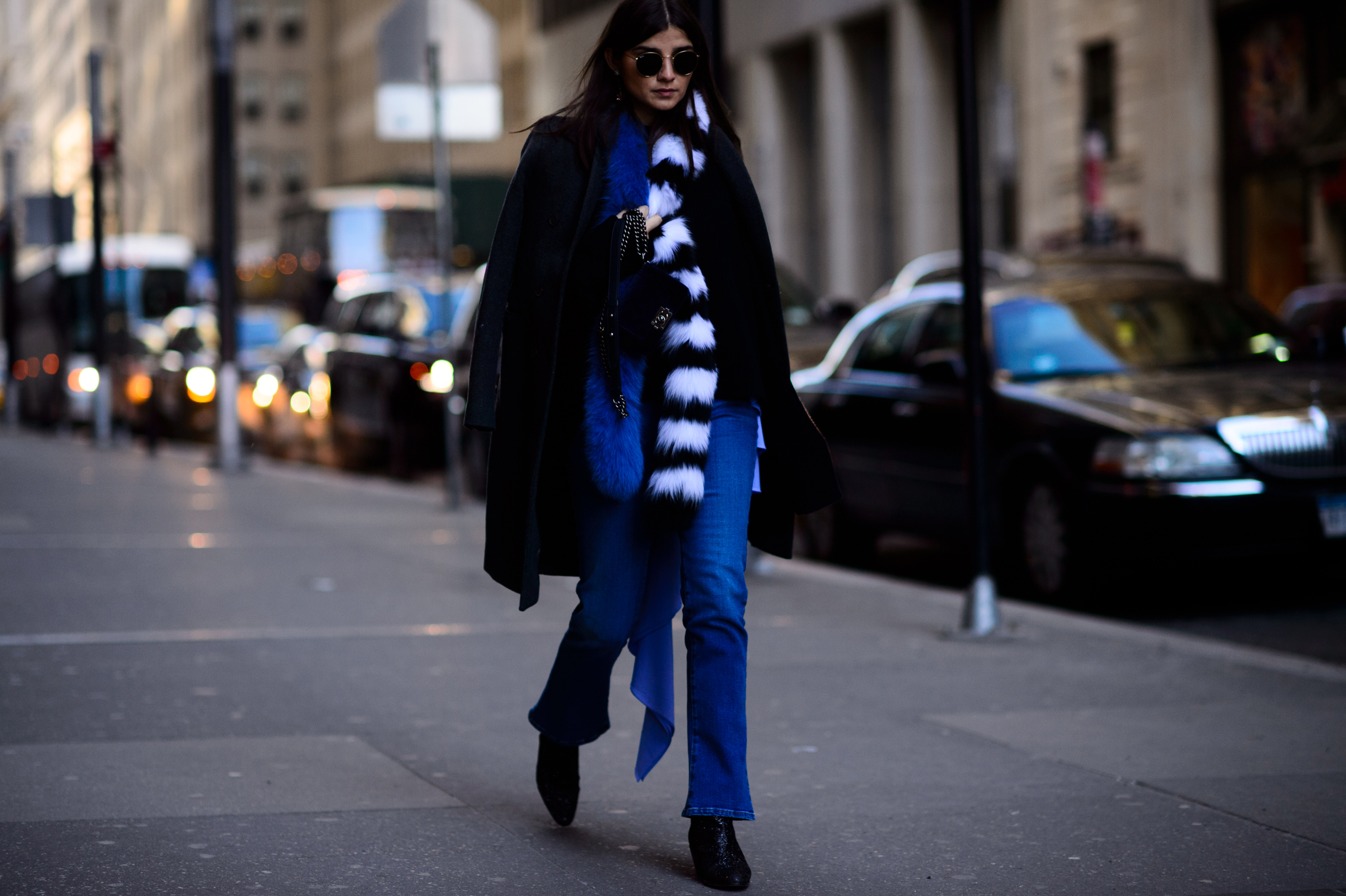 Woman wearing denim and fur