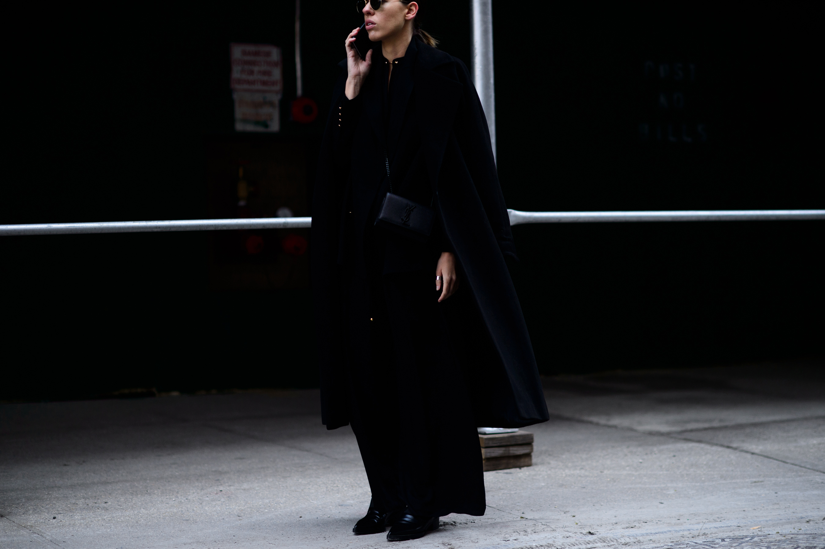 Woman wearing black coat