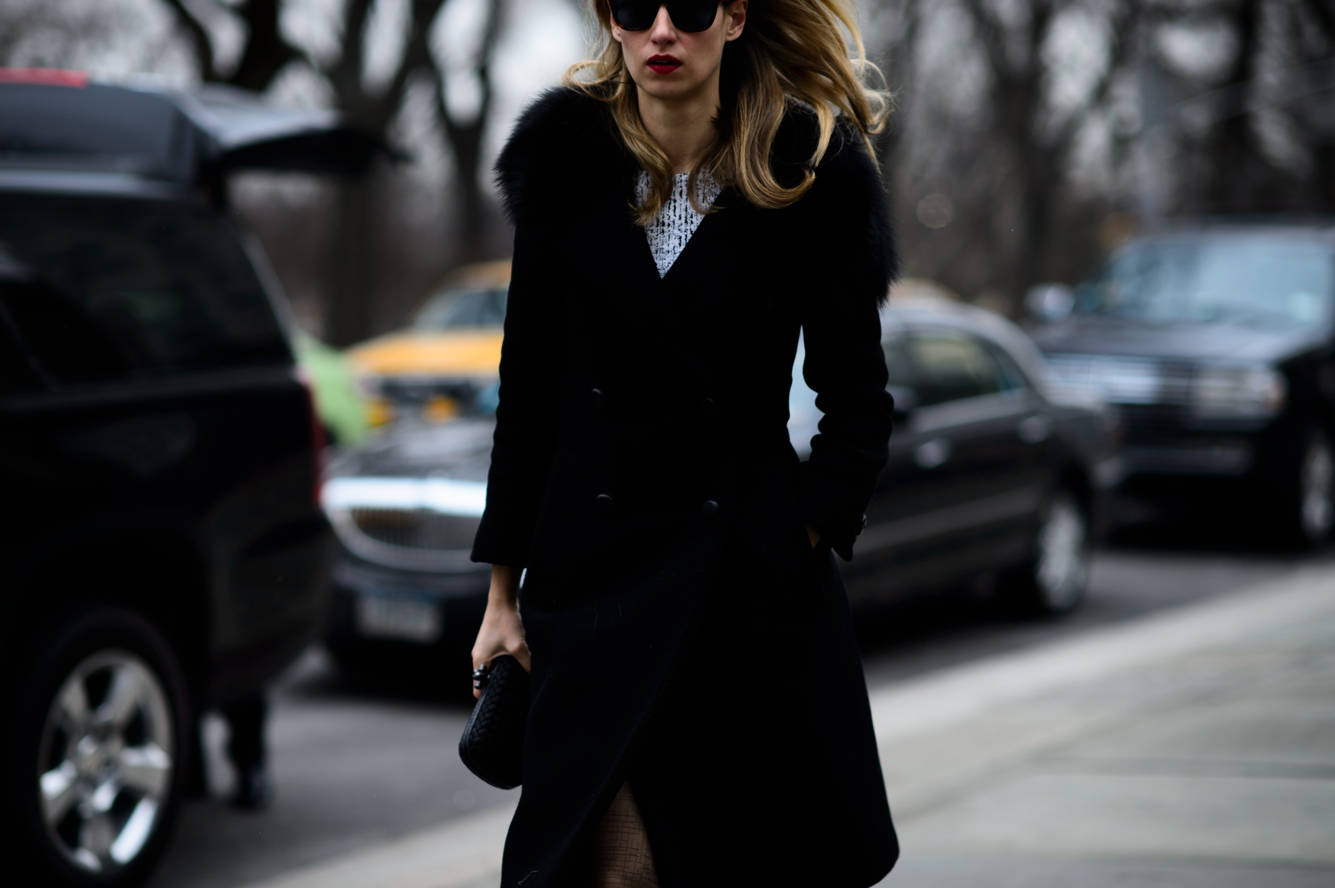 Woman wearing black coat