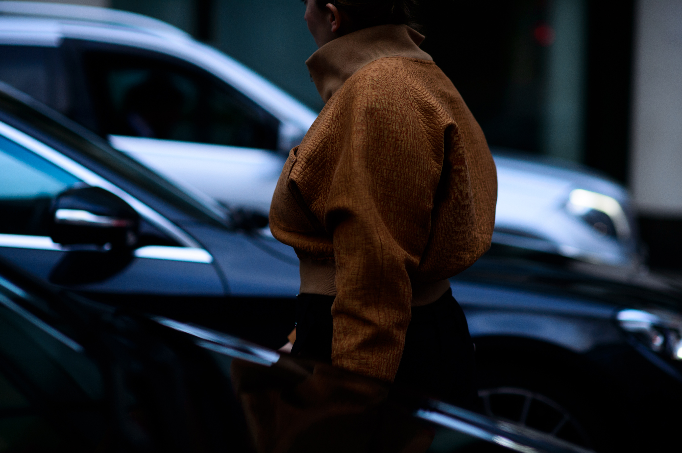 Woman wearing oversized bomber