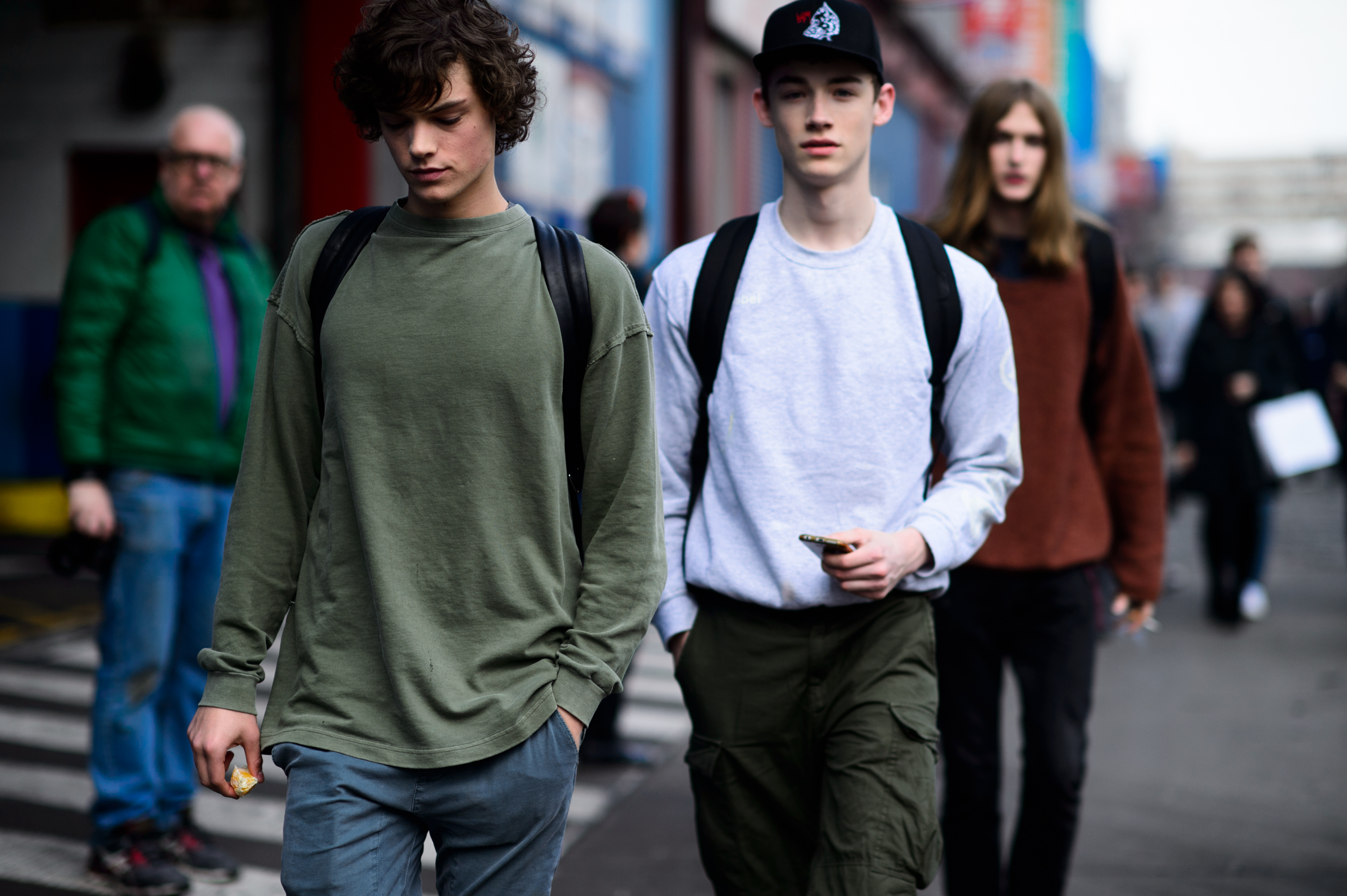 Two male models after show