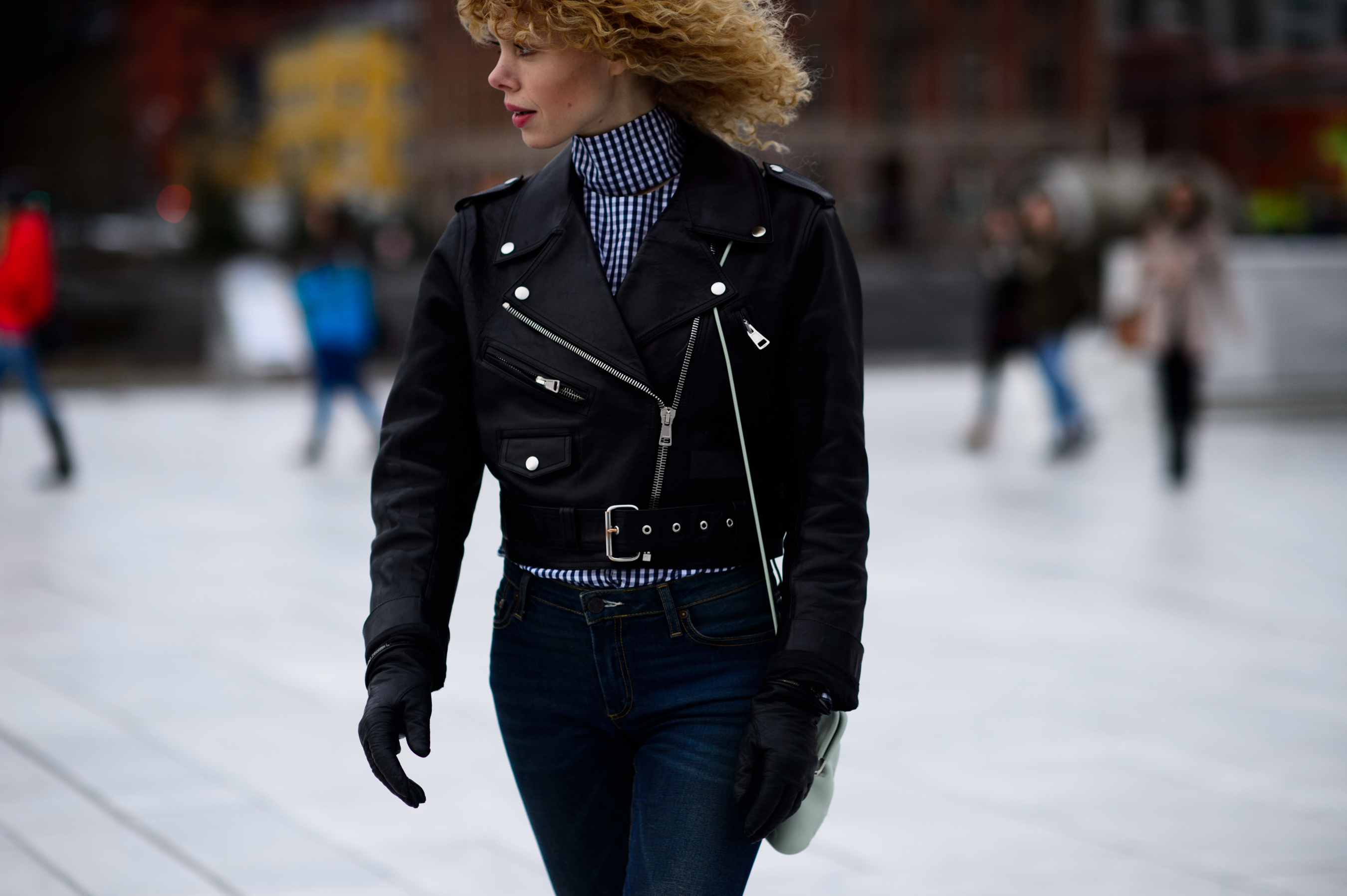 Woman in black leather jacket