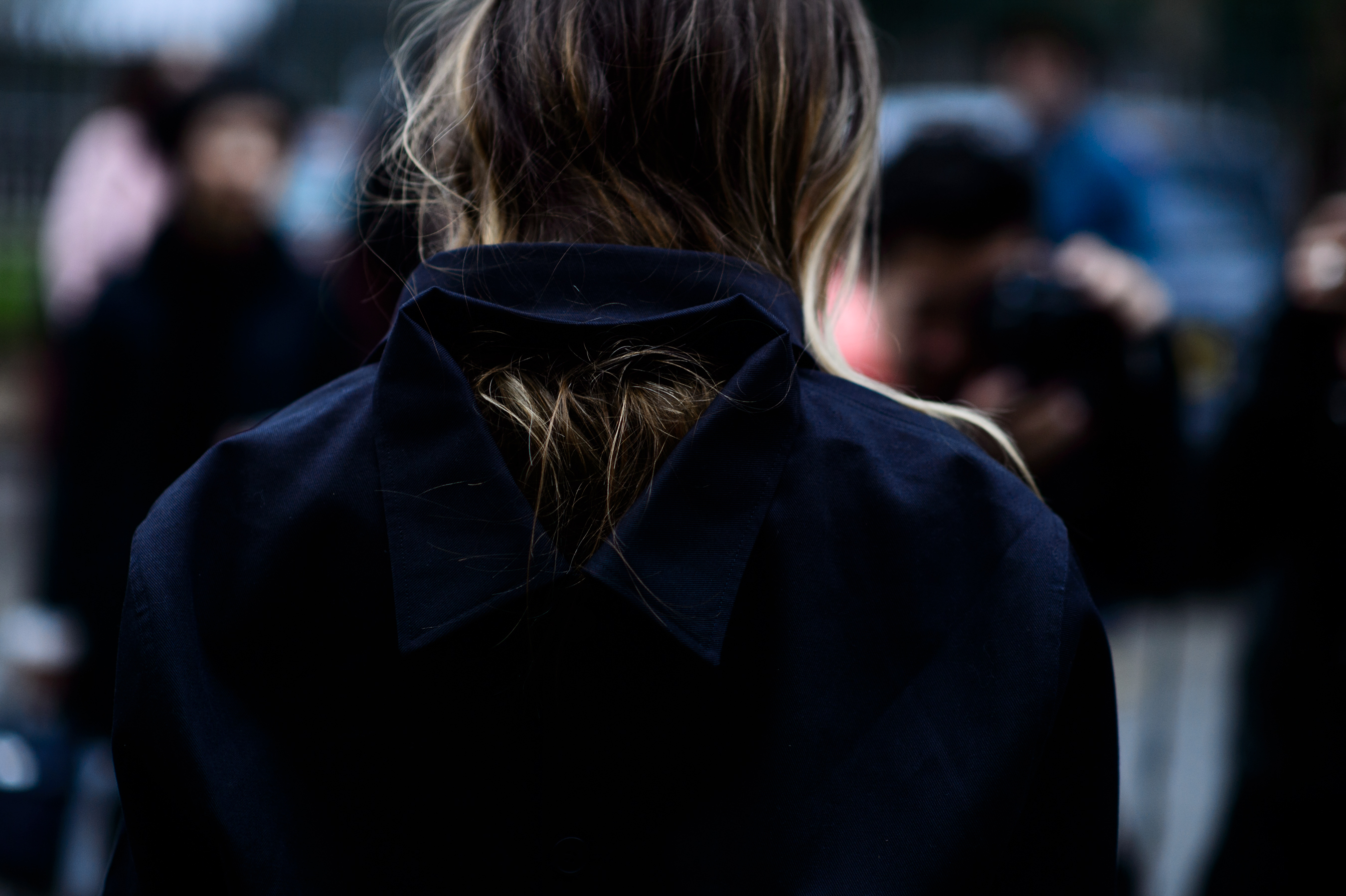 Woman wearing reversed collar shirt
