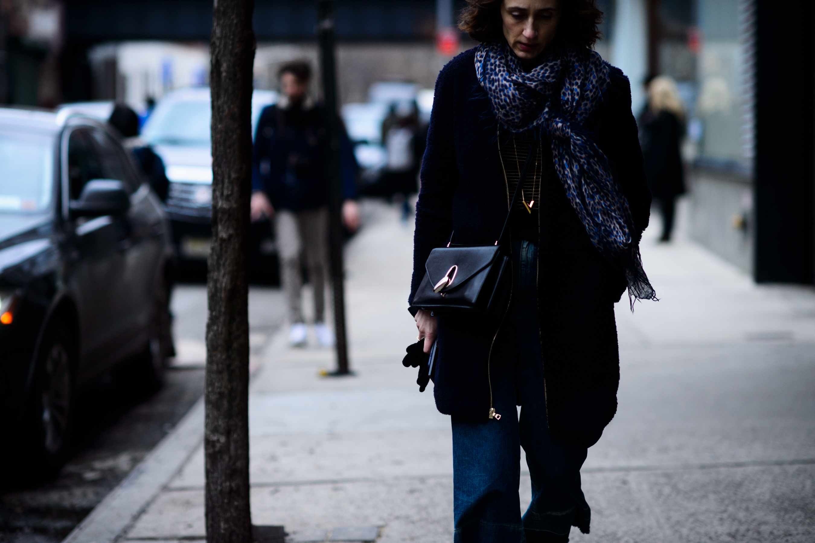 Fashion journalist wearing blue scarf