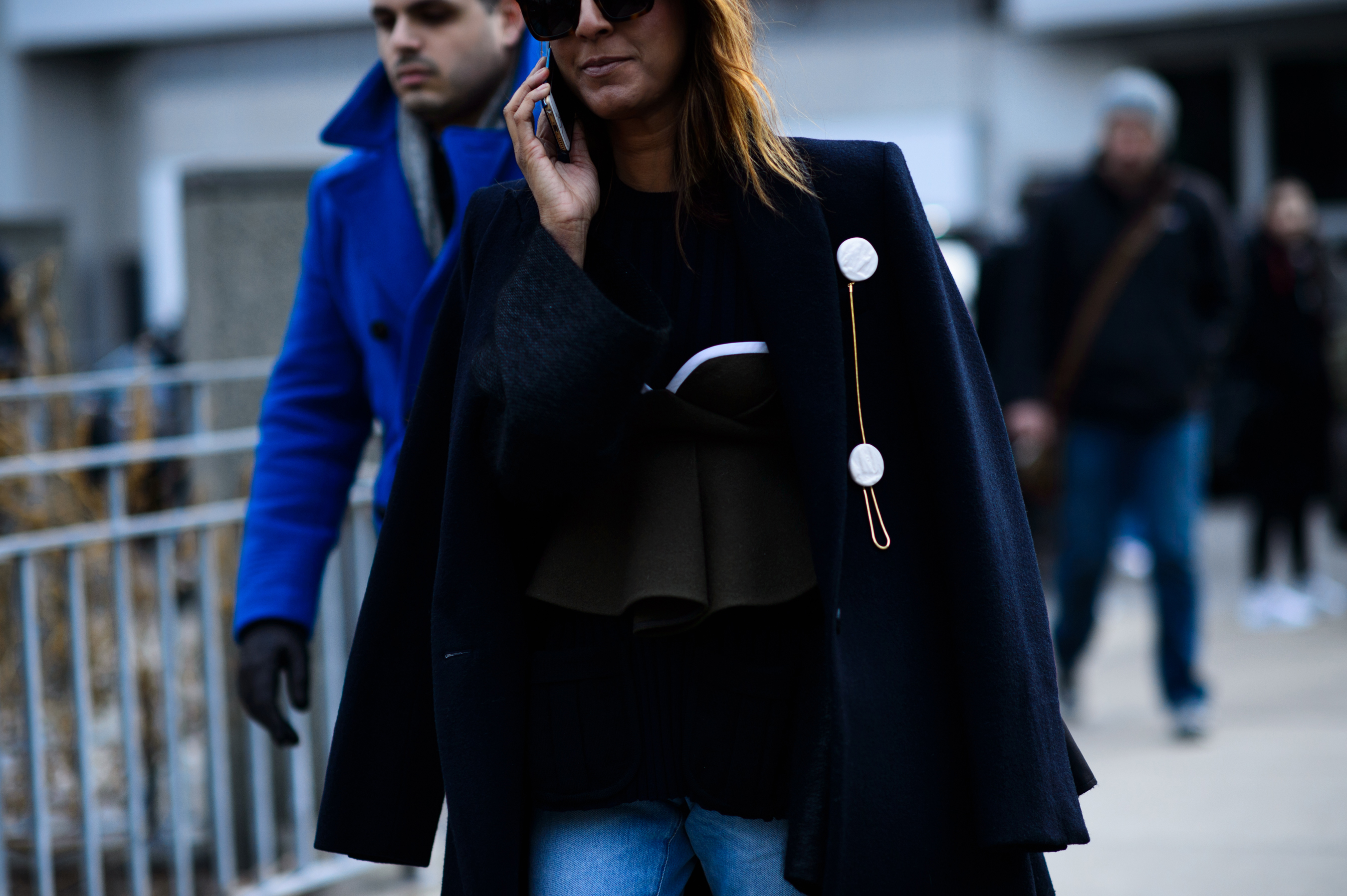 Woman wearing top over shirt