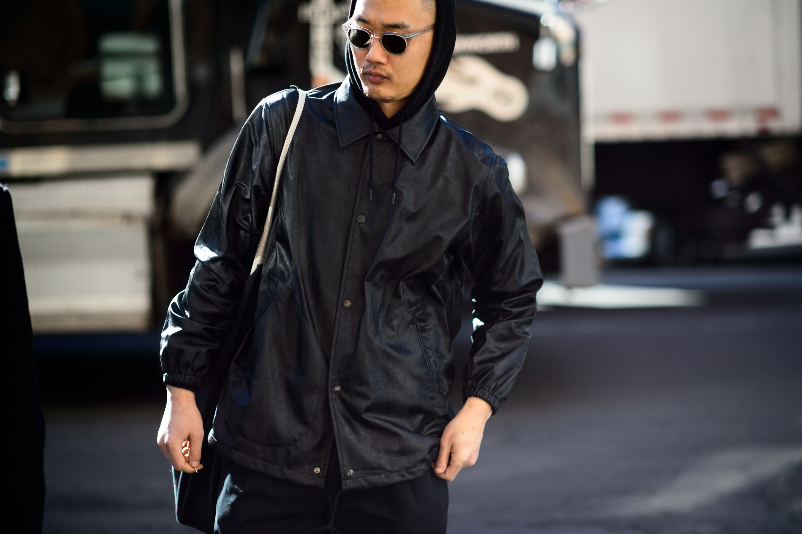 American photographer wearing black