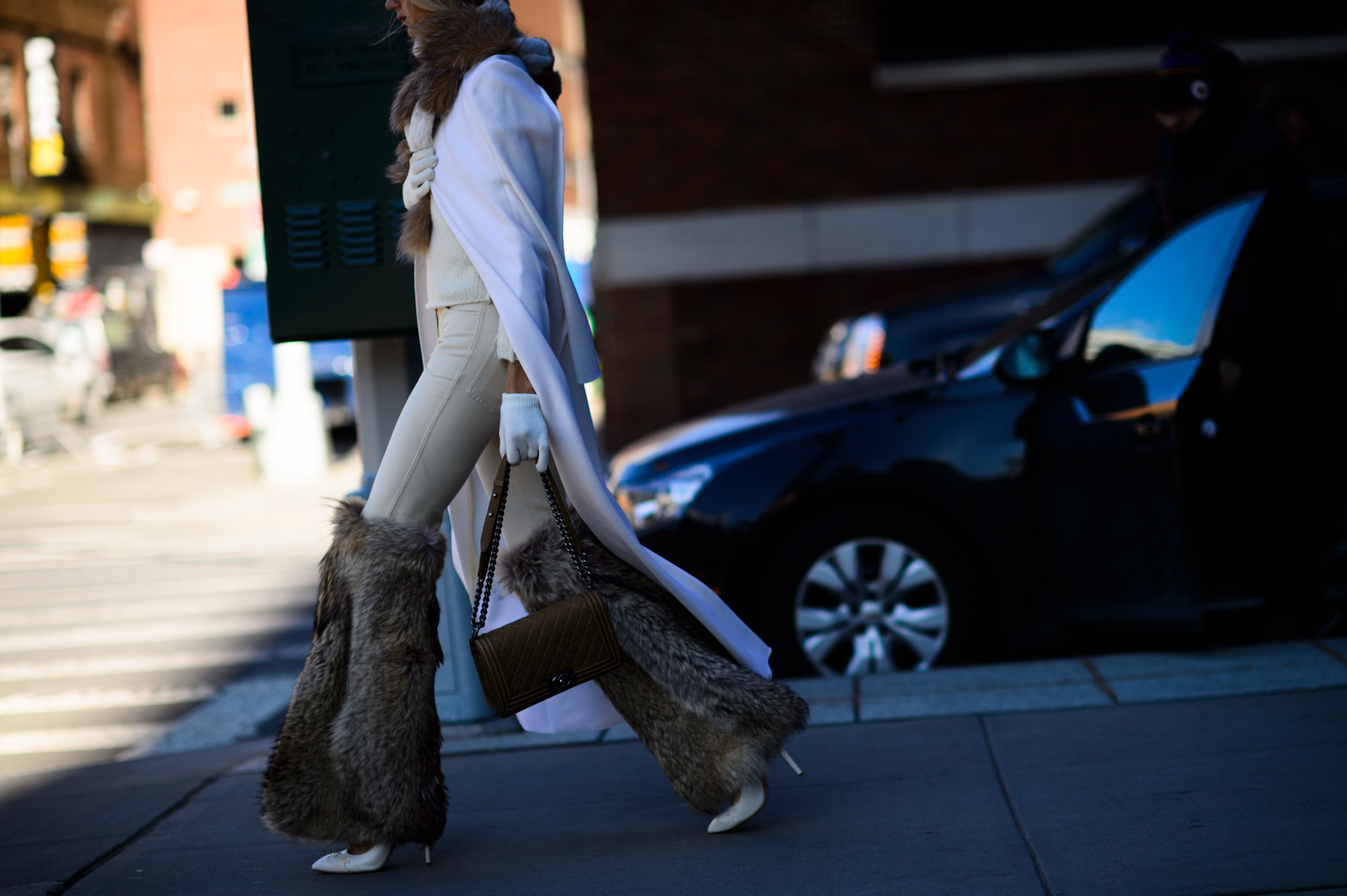 Woman wearing fur pants