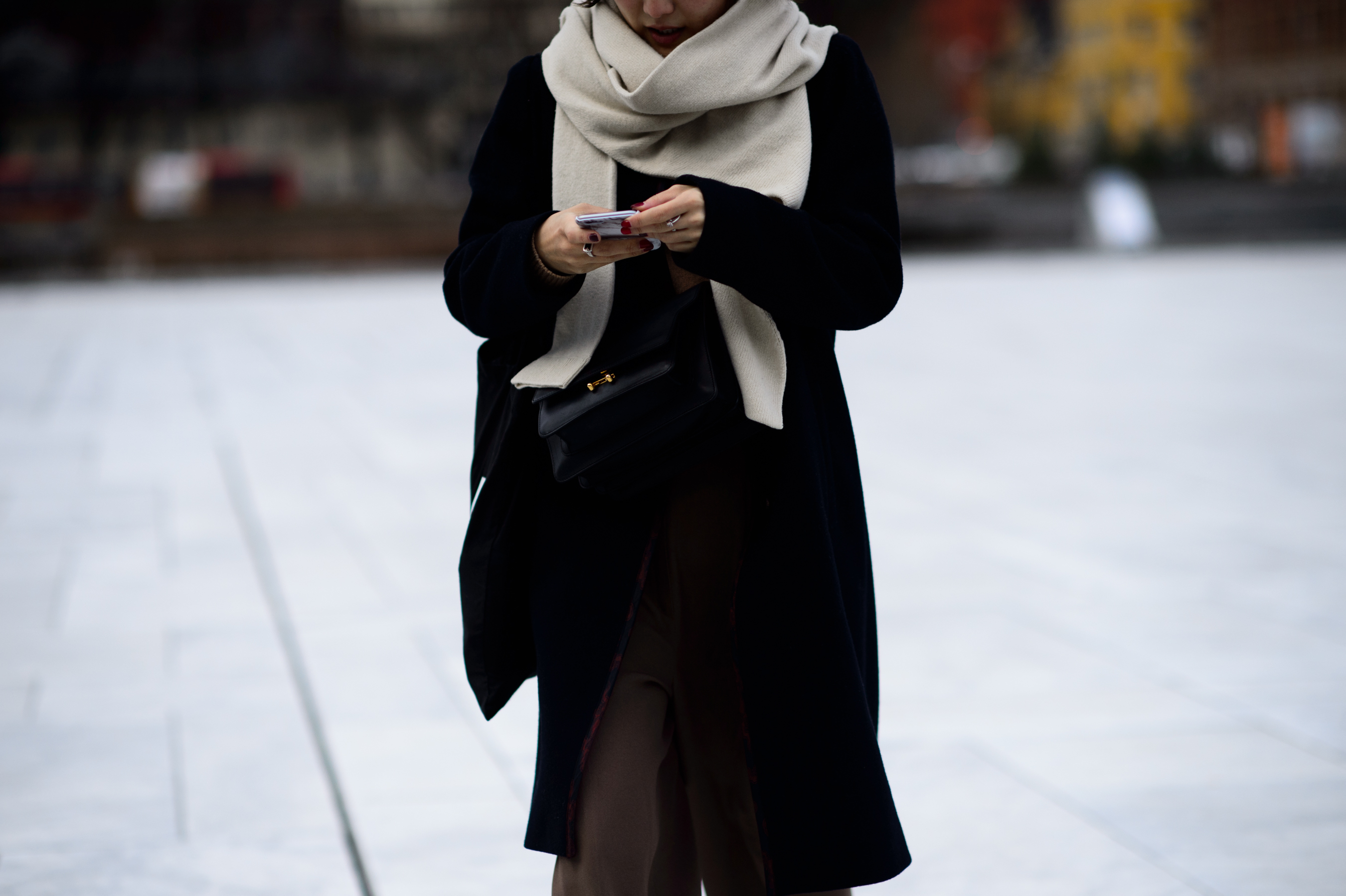 Woman in beige scarf