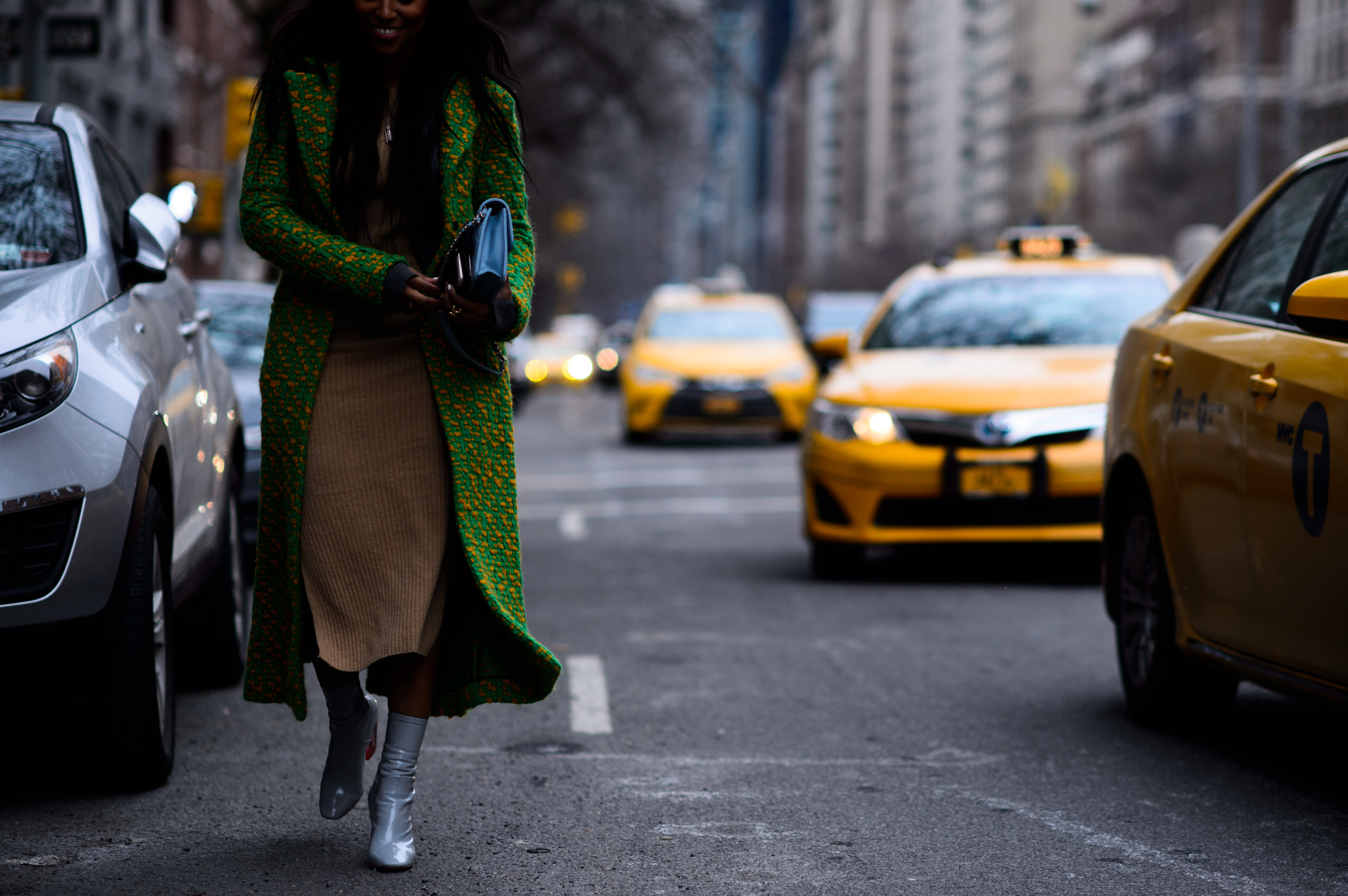 Stylist wearing green coat