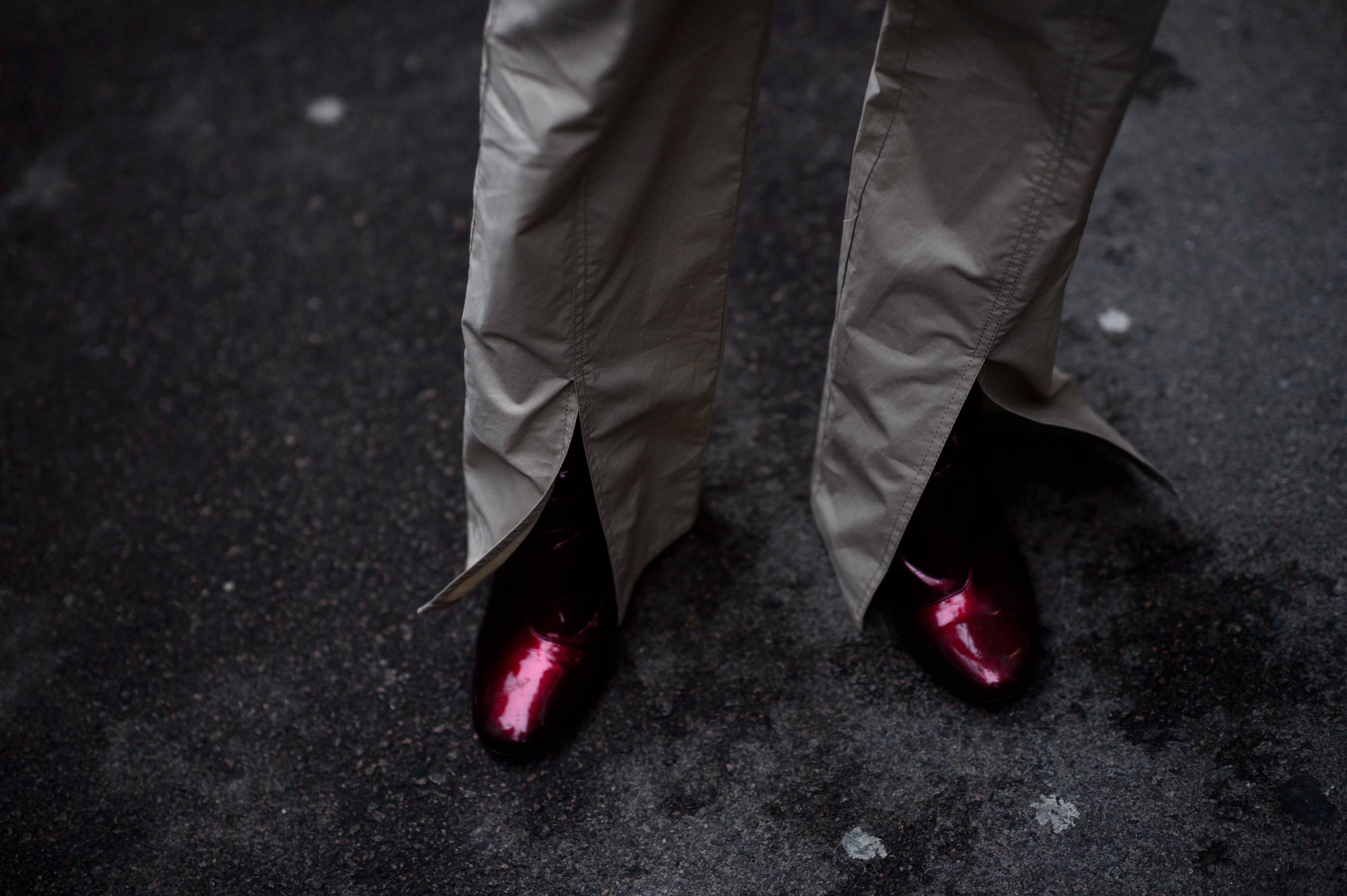 Red boots and beige pants