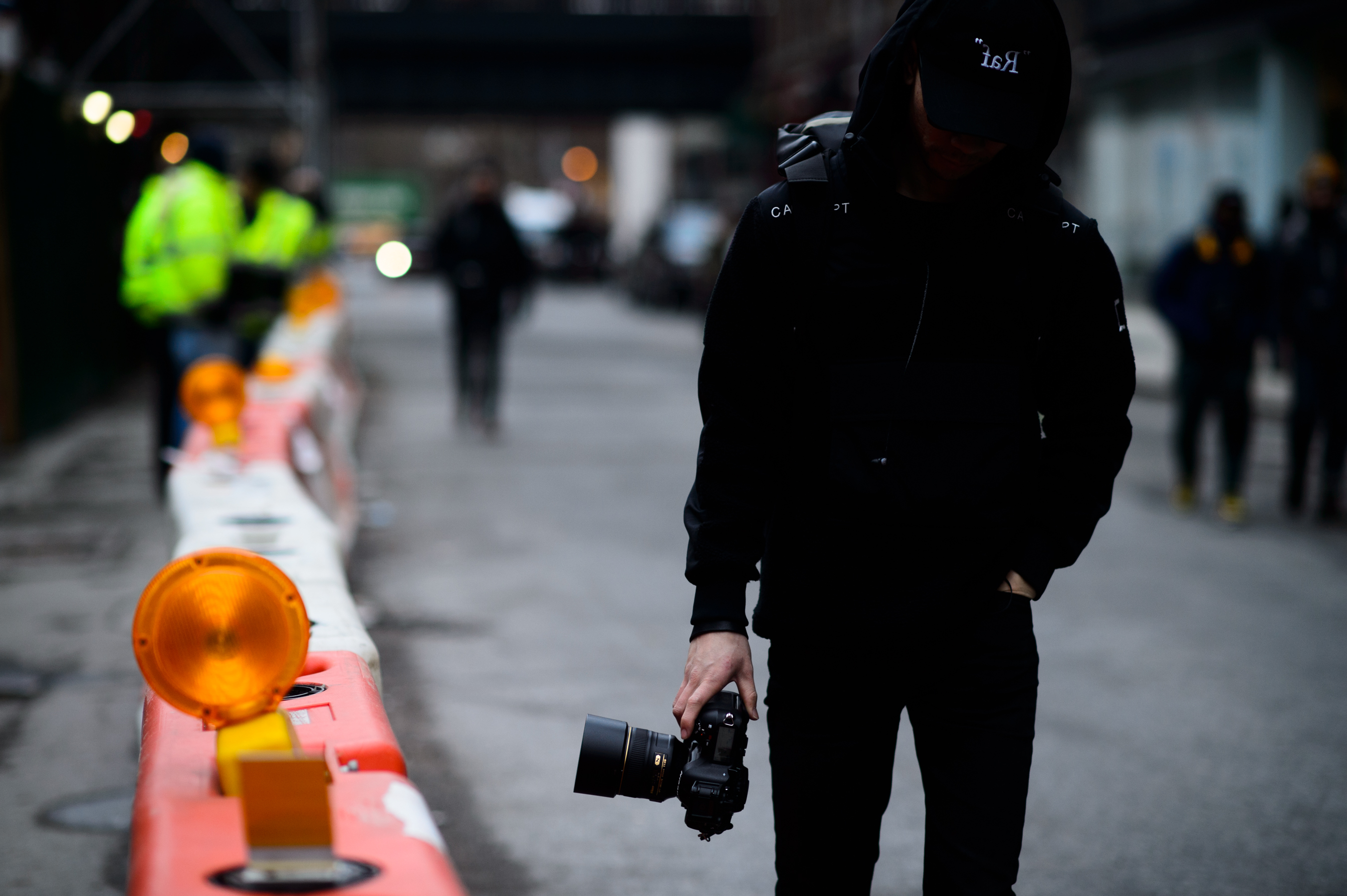 American photographer wearing black
