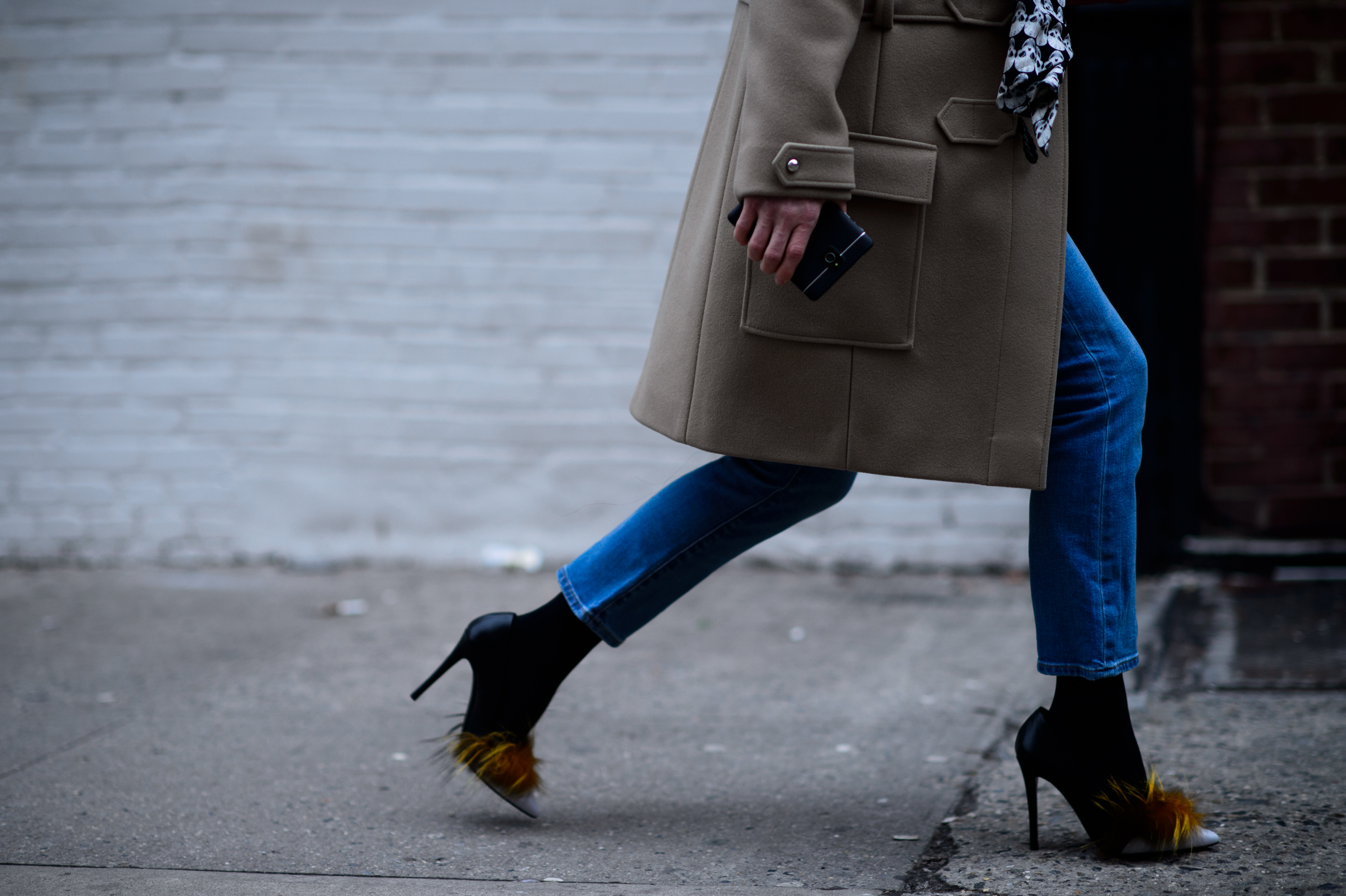 Woman wearing shoes with fur