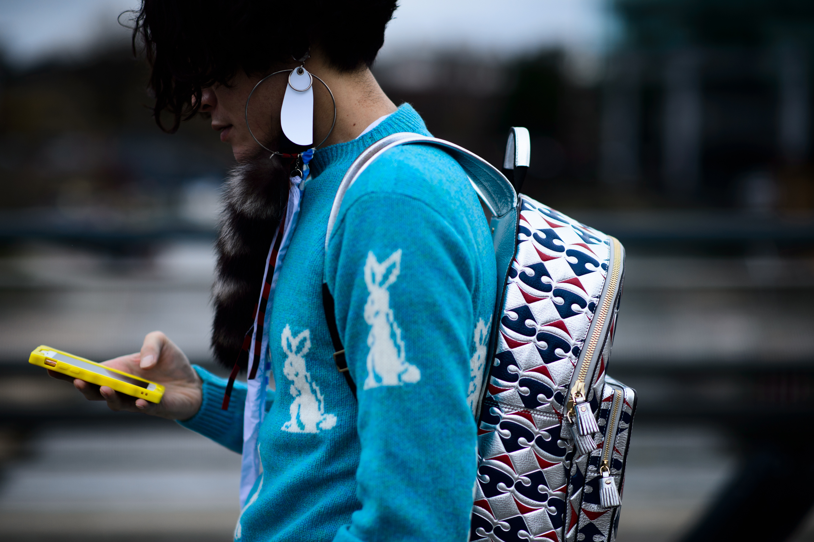 Japanese man wearing blue rabbit sweater
