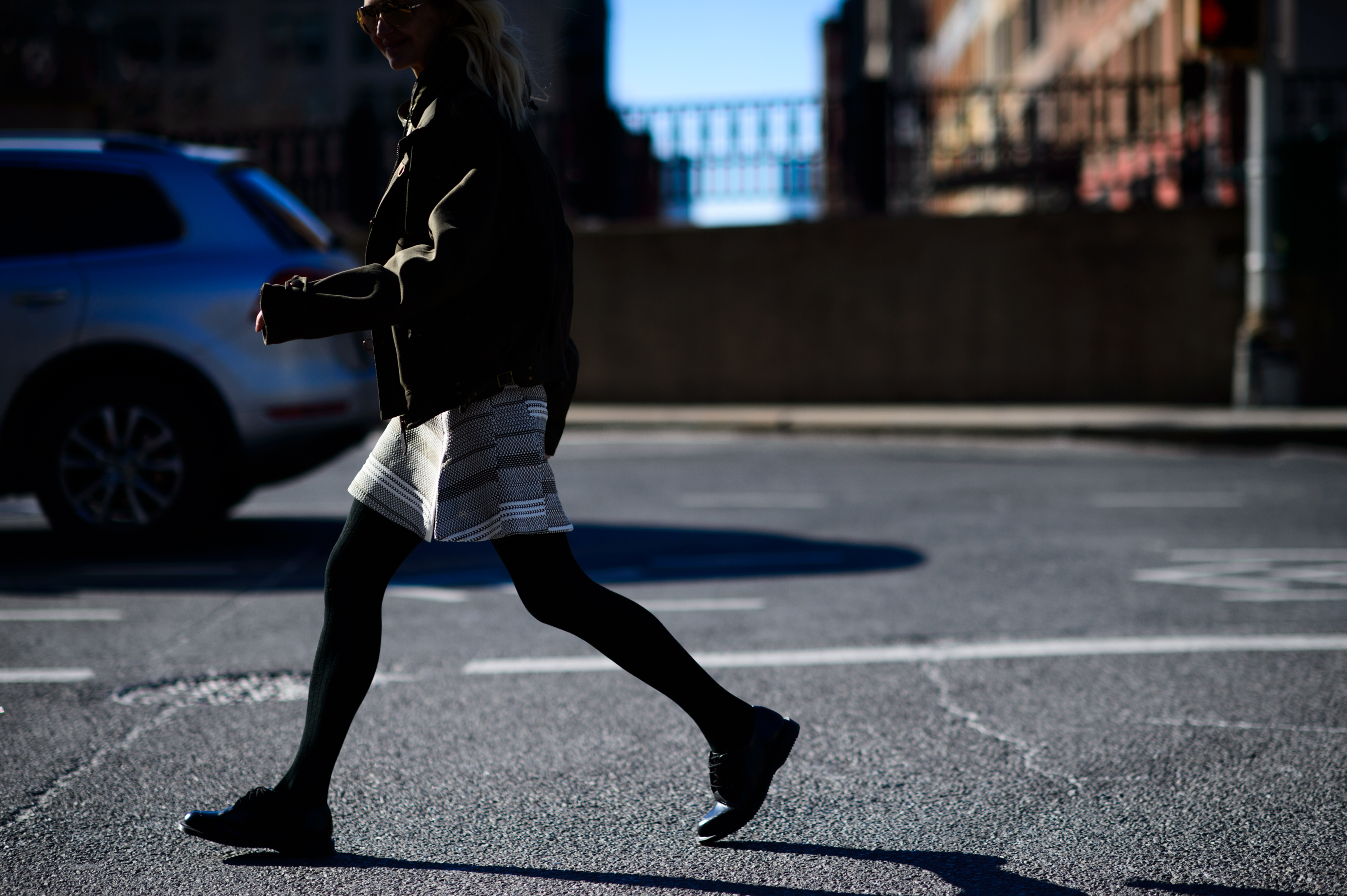 Woman crossing the road
