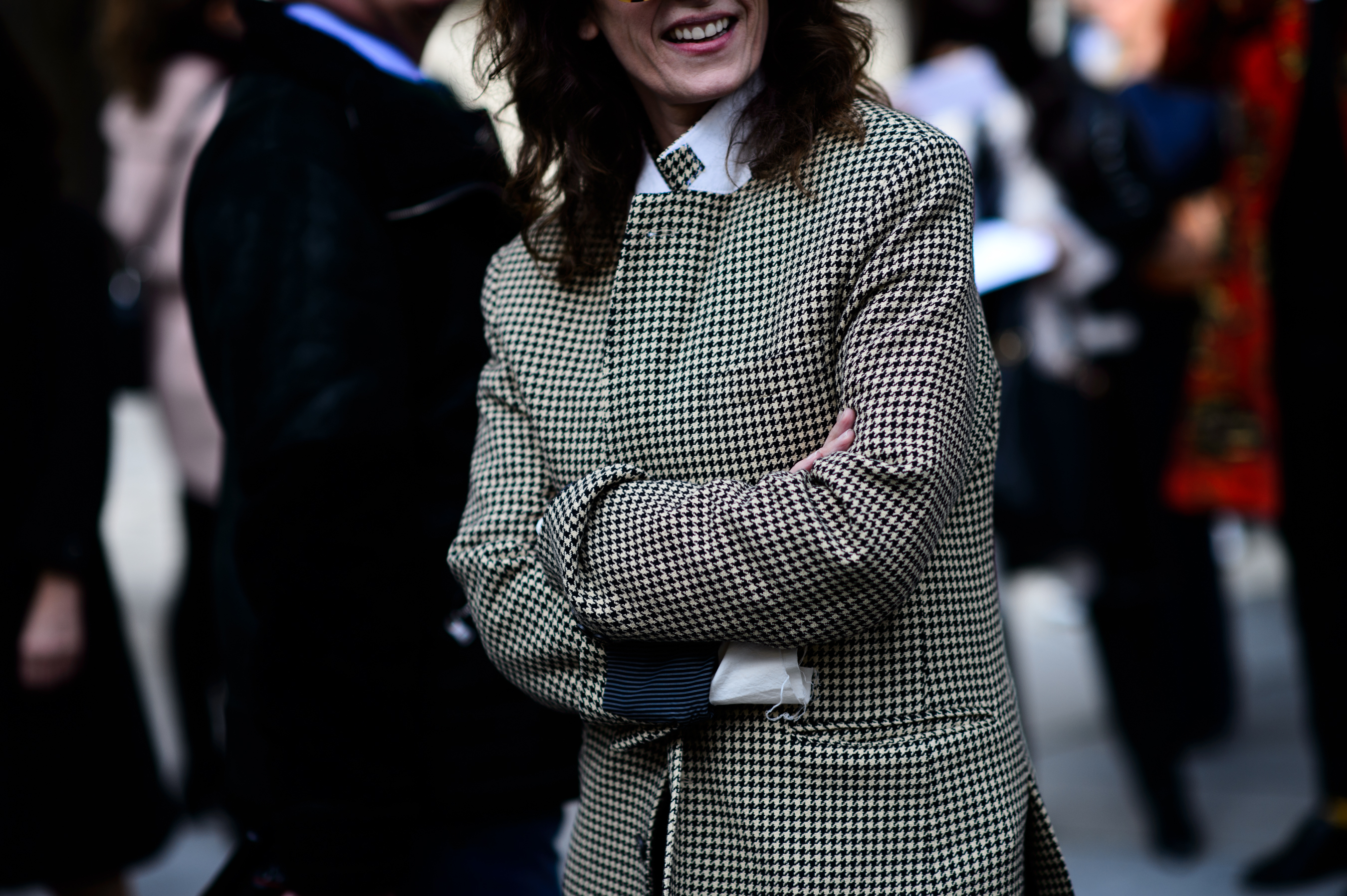 Woman wearing black and white pattern jacket