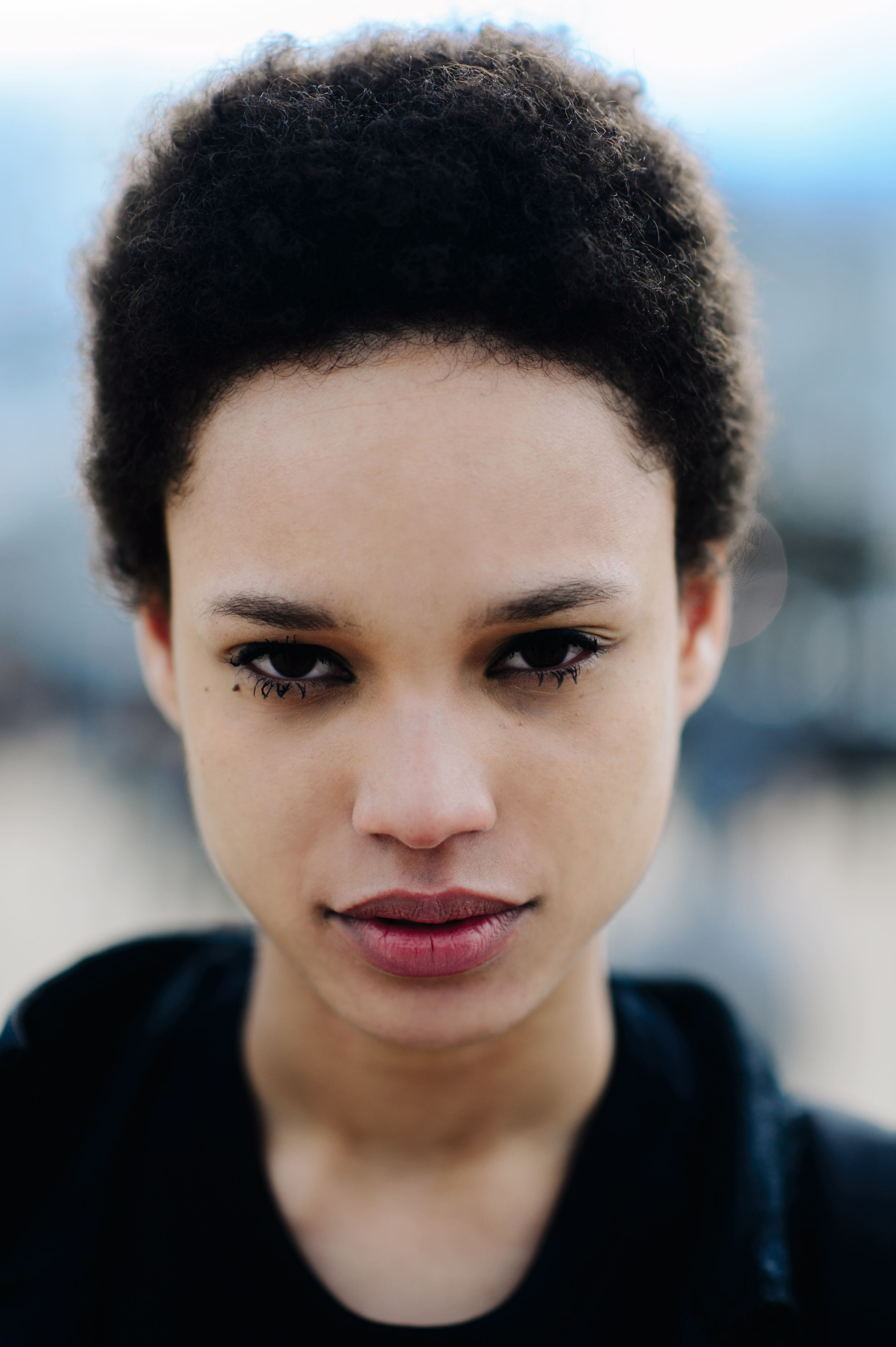 Portrait of model with short hair.