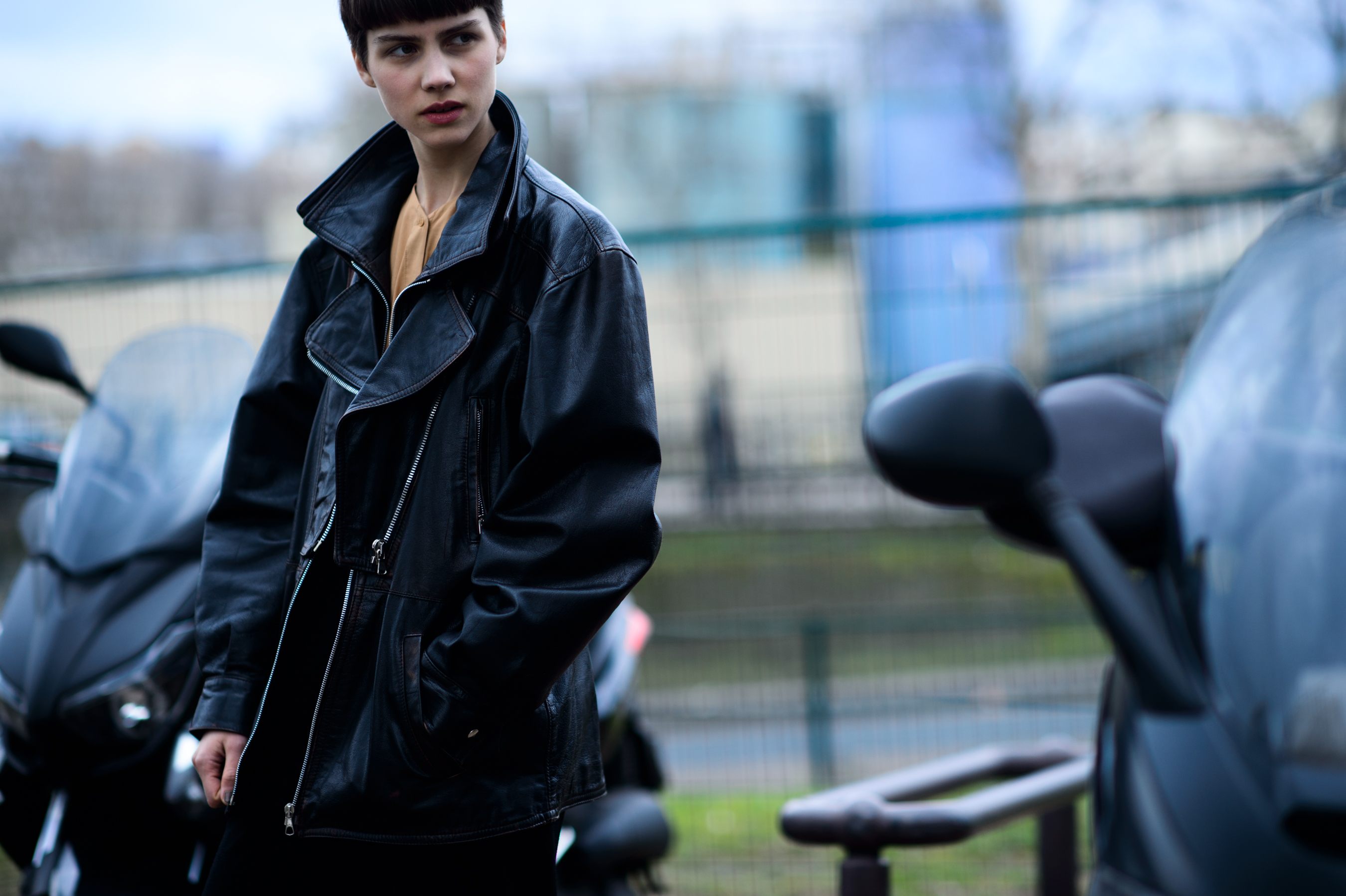 Model in black leather jacket
