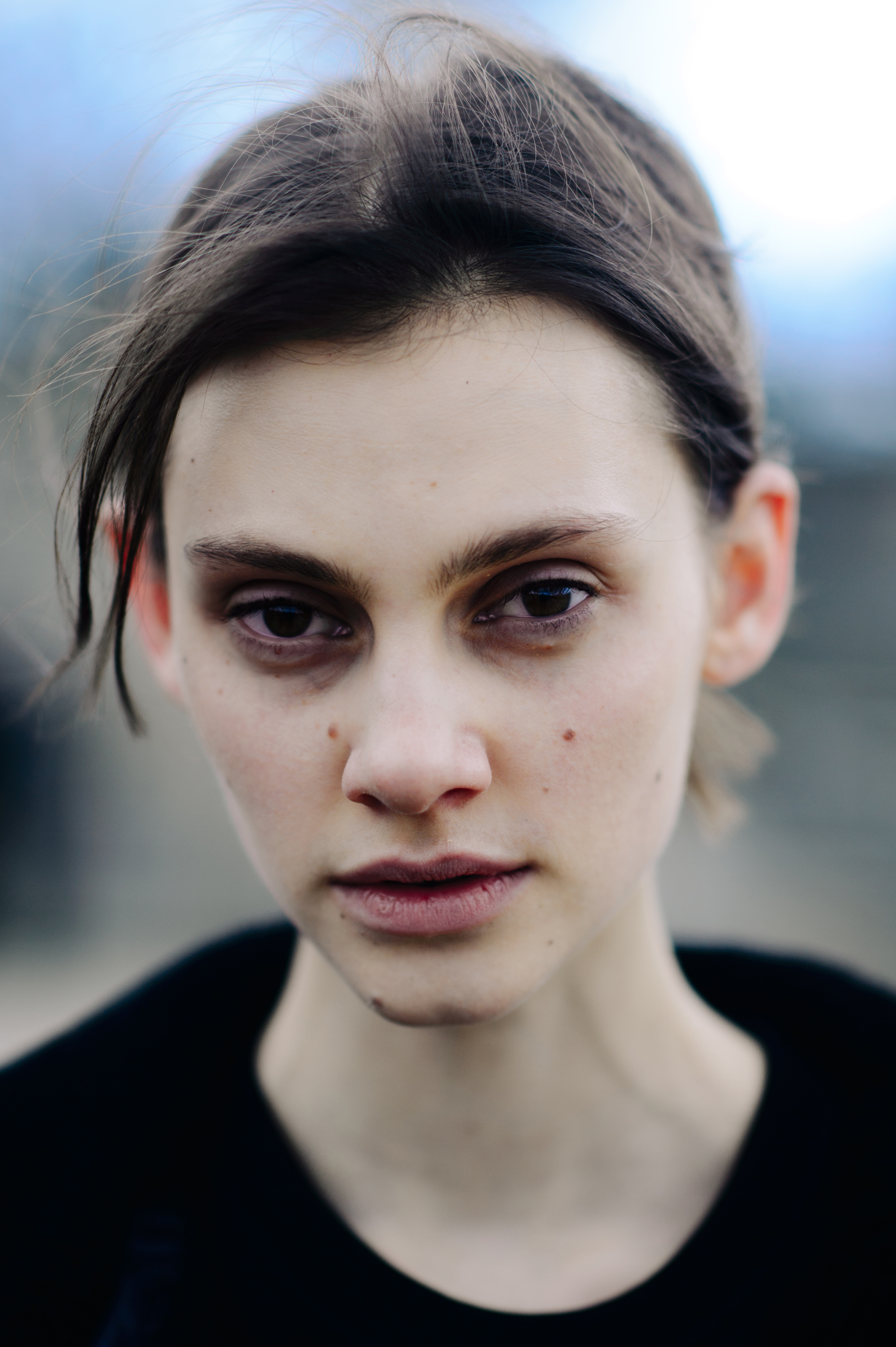 Portrait of Dutch model with hair tied back