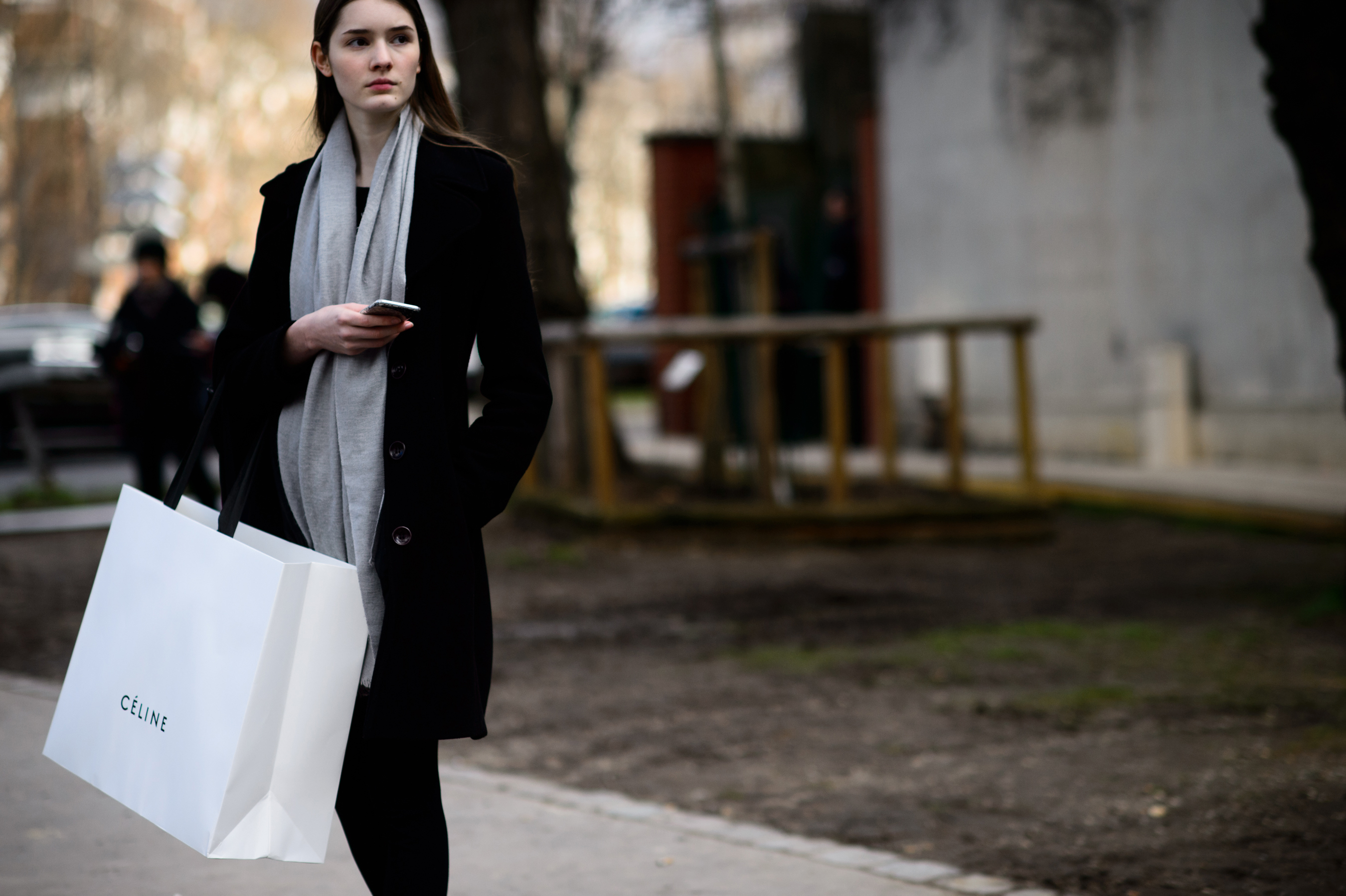Model in grey scarf after show